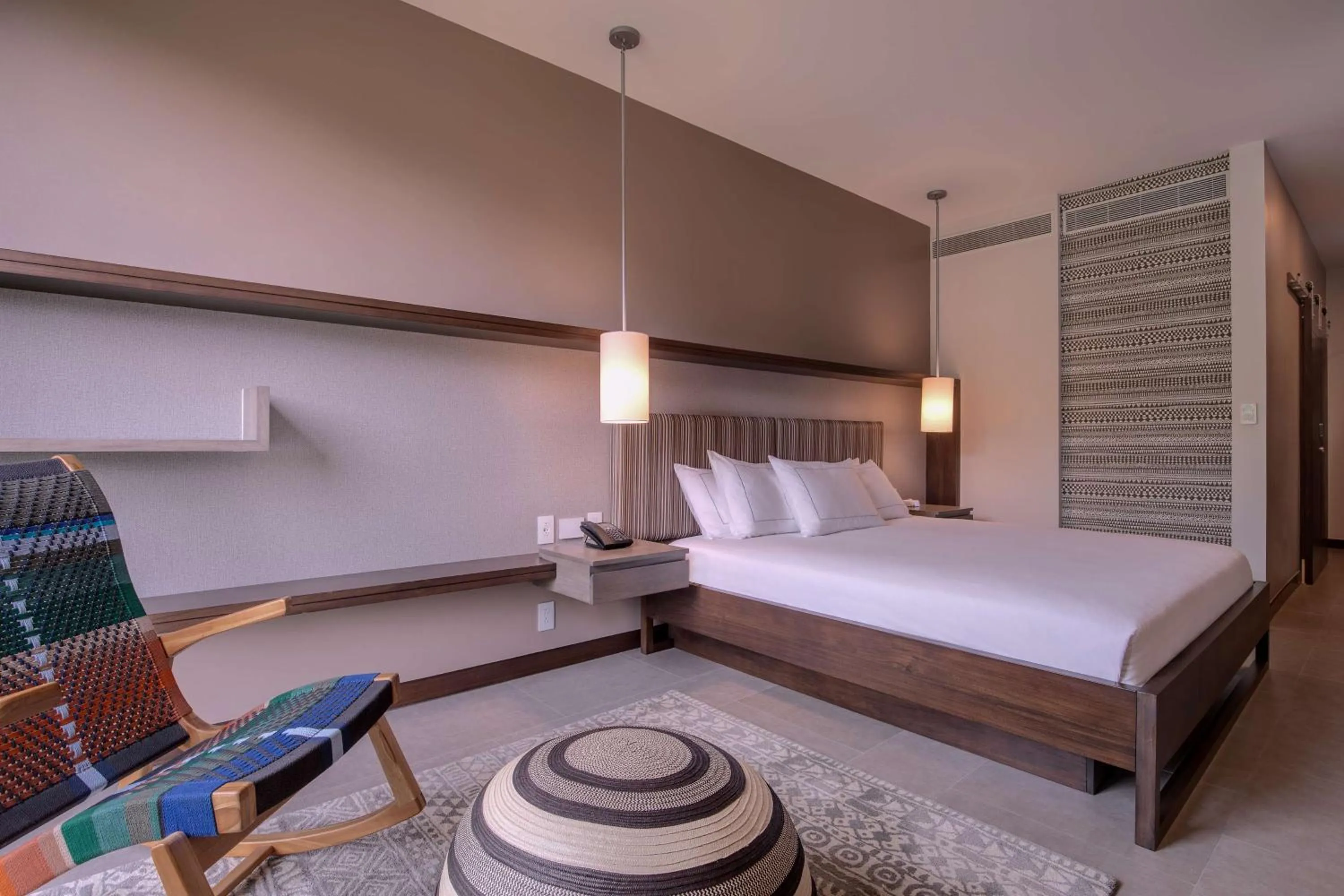 Bed in Botanika Osa Peninsula, Curio Collection By Hilton