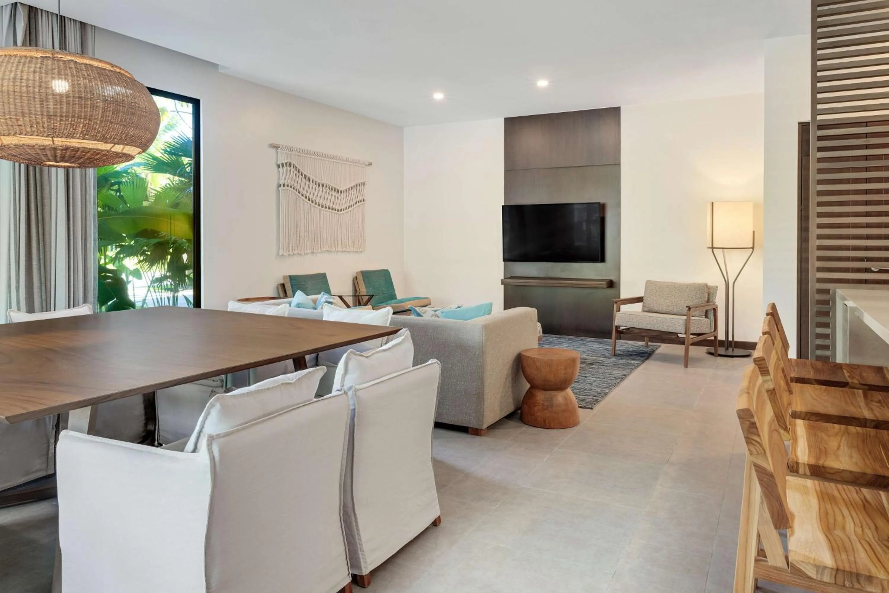 Living room in Botanika Osa Peninsula, Curio Collection By Hilton