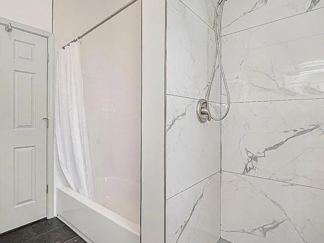 Shower in Spacious 5-BR Apt next to transit Free Parking