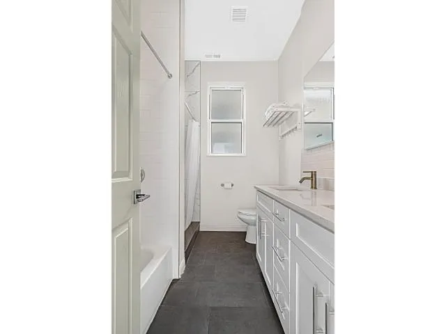 Bathroom in Spacious 5-BR Apt next to transit Free Parking