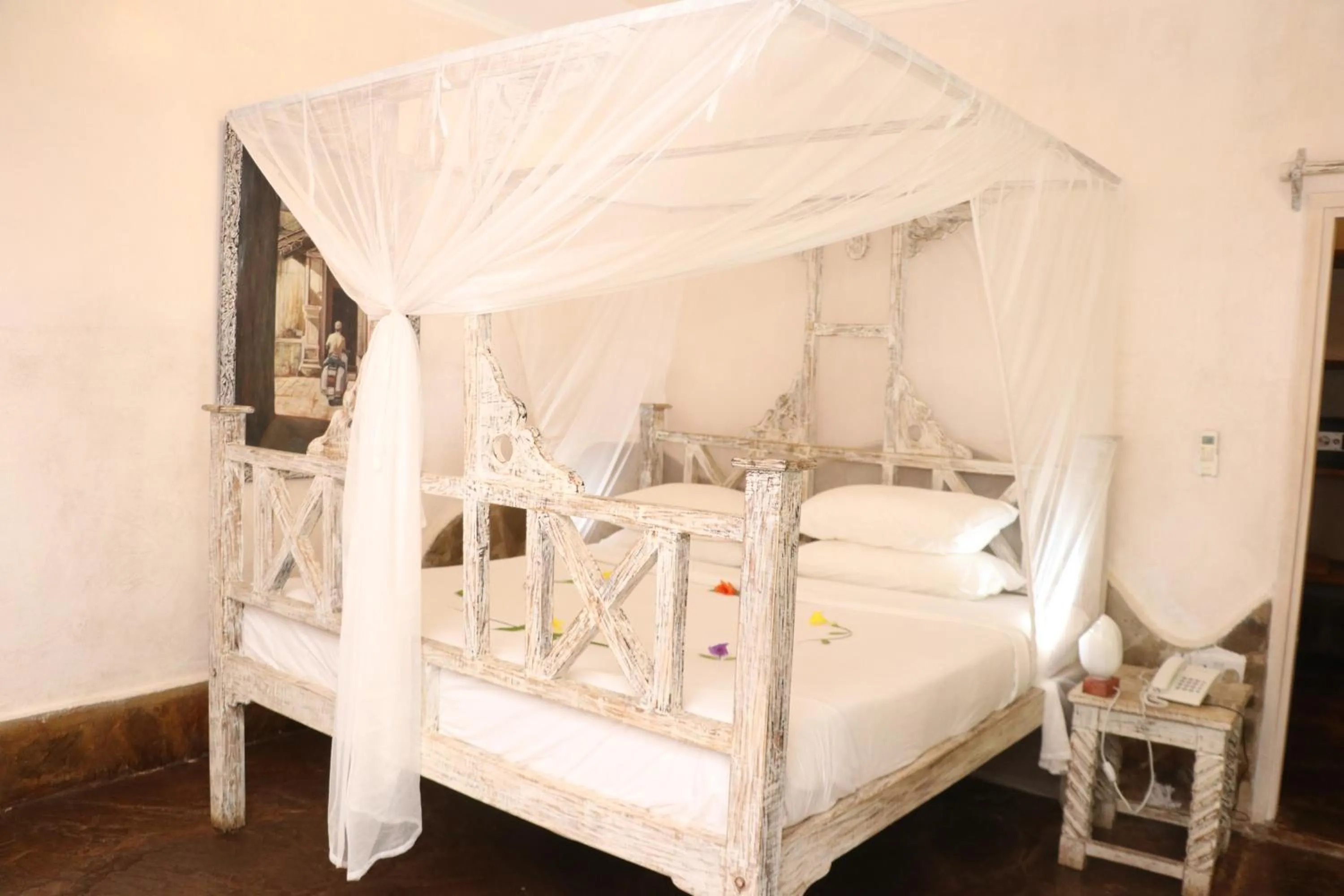 Bed in Eleven Pearl Boutique Hotel & Spa