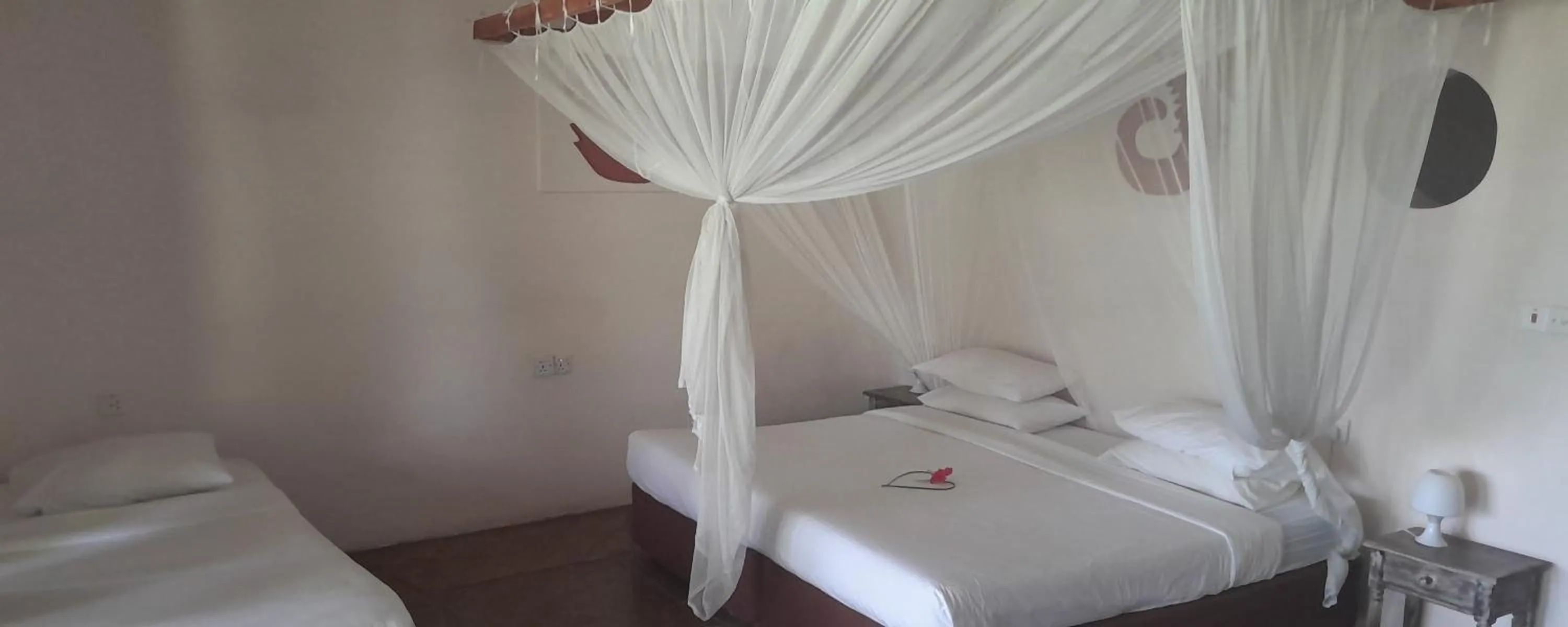 Bed in Eleven Pearl Boutique Hotel & Spa