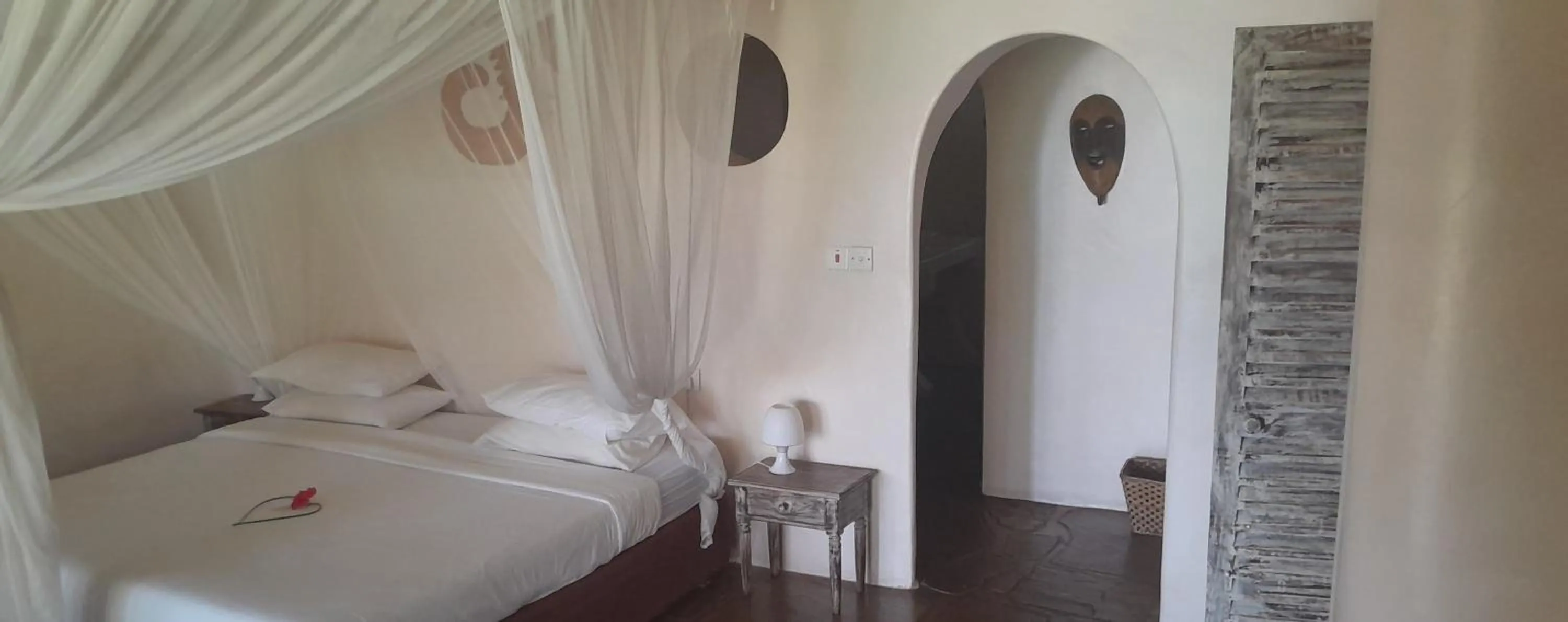 Bed in Eleven Pearl Boutique Hotel & Spa