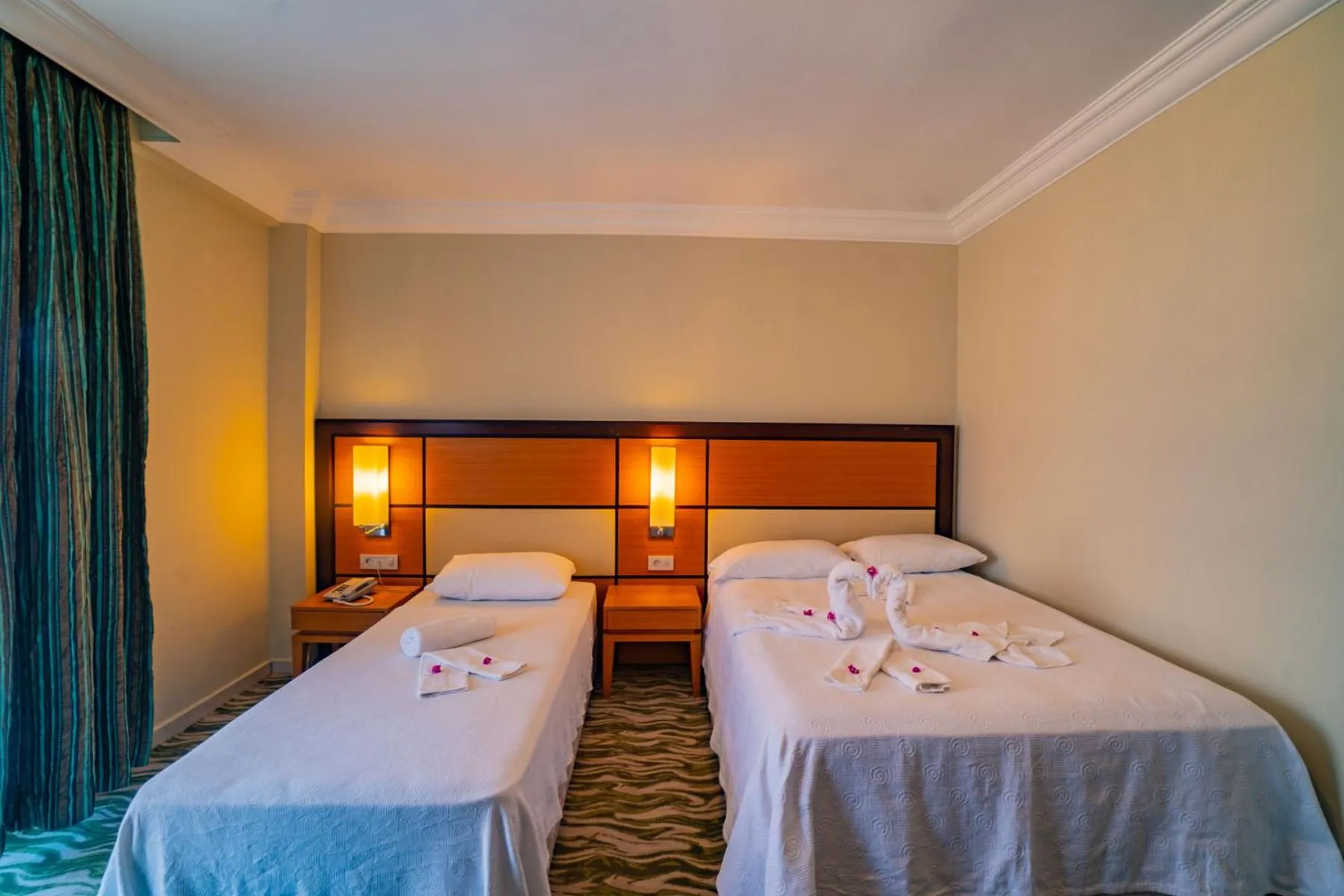 Bed in Prenses Sealine Beach Hotel