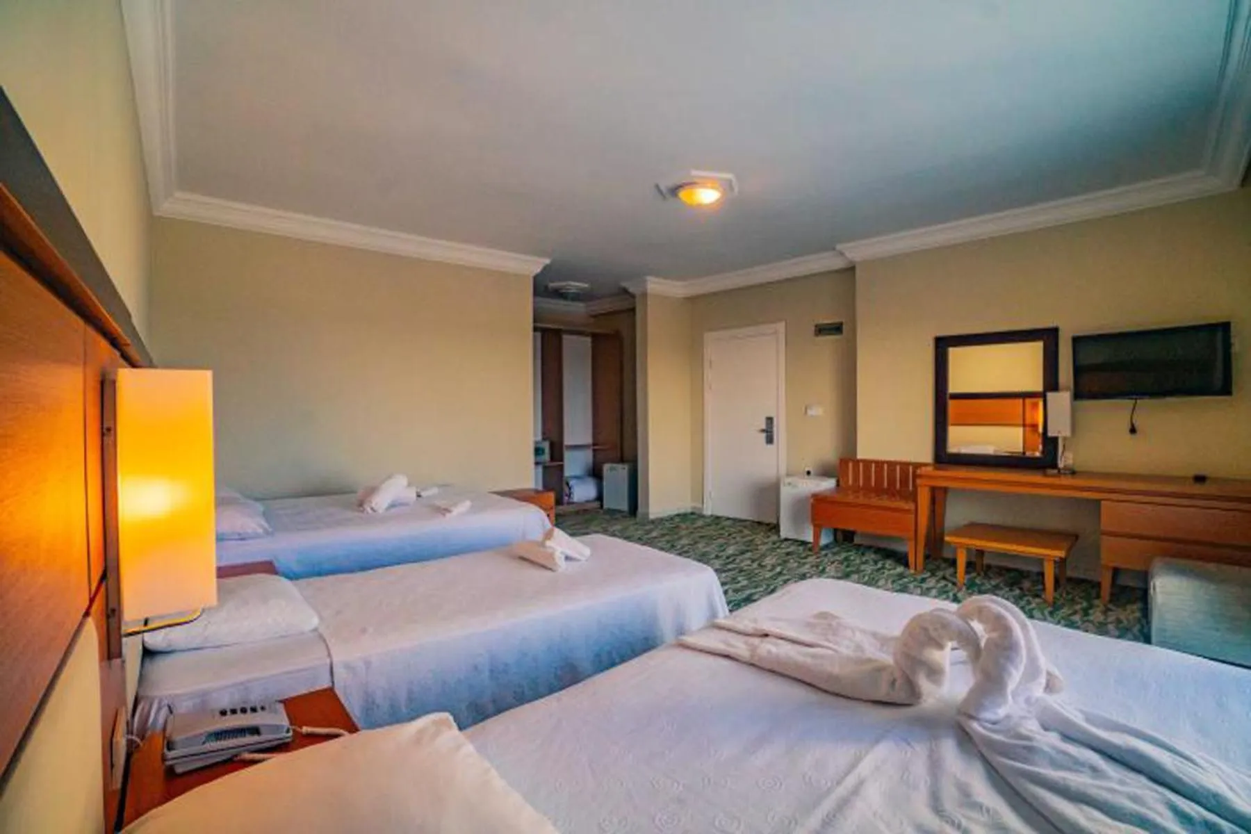 Bed in Prenses Sealine Beach Hotel