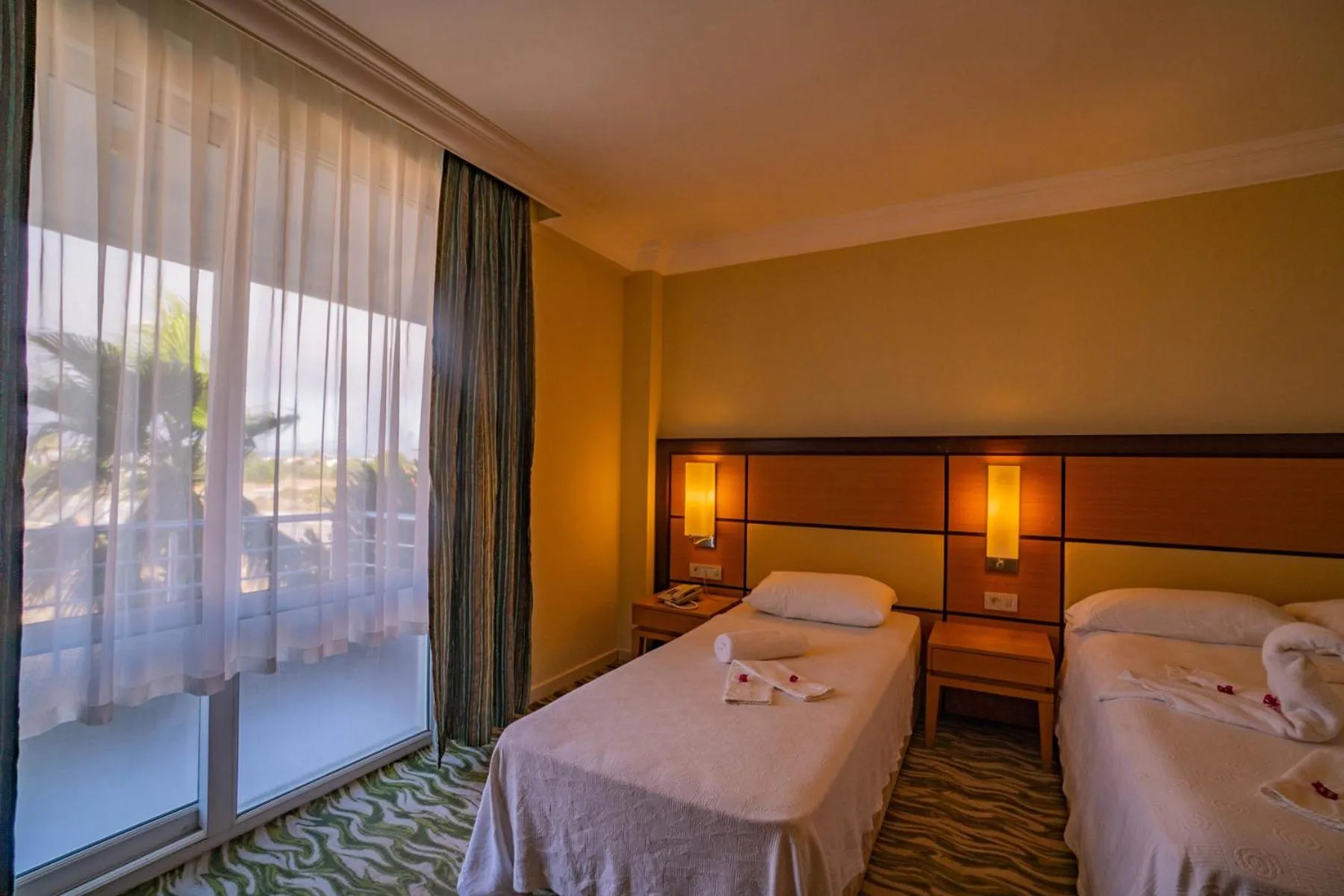 Bed in Prenses Sealine Beach Hotel