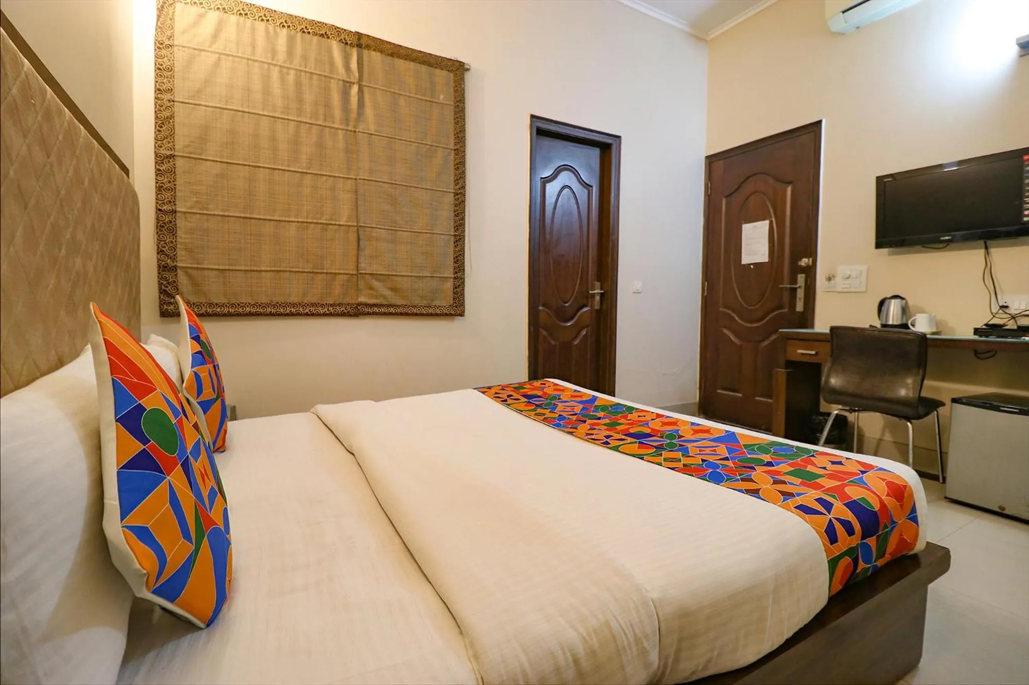 Bed in FabExpress Llyod Residency