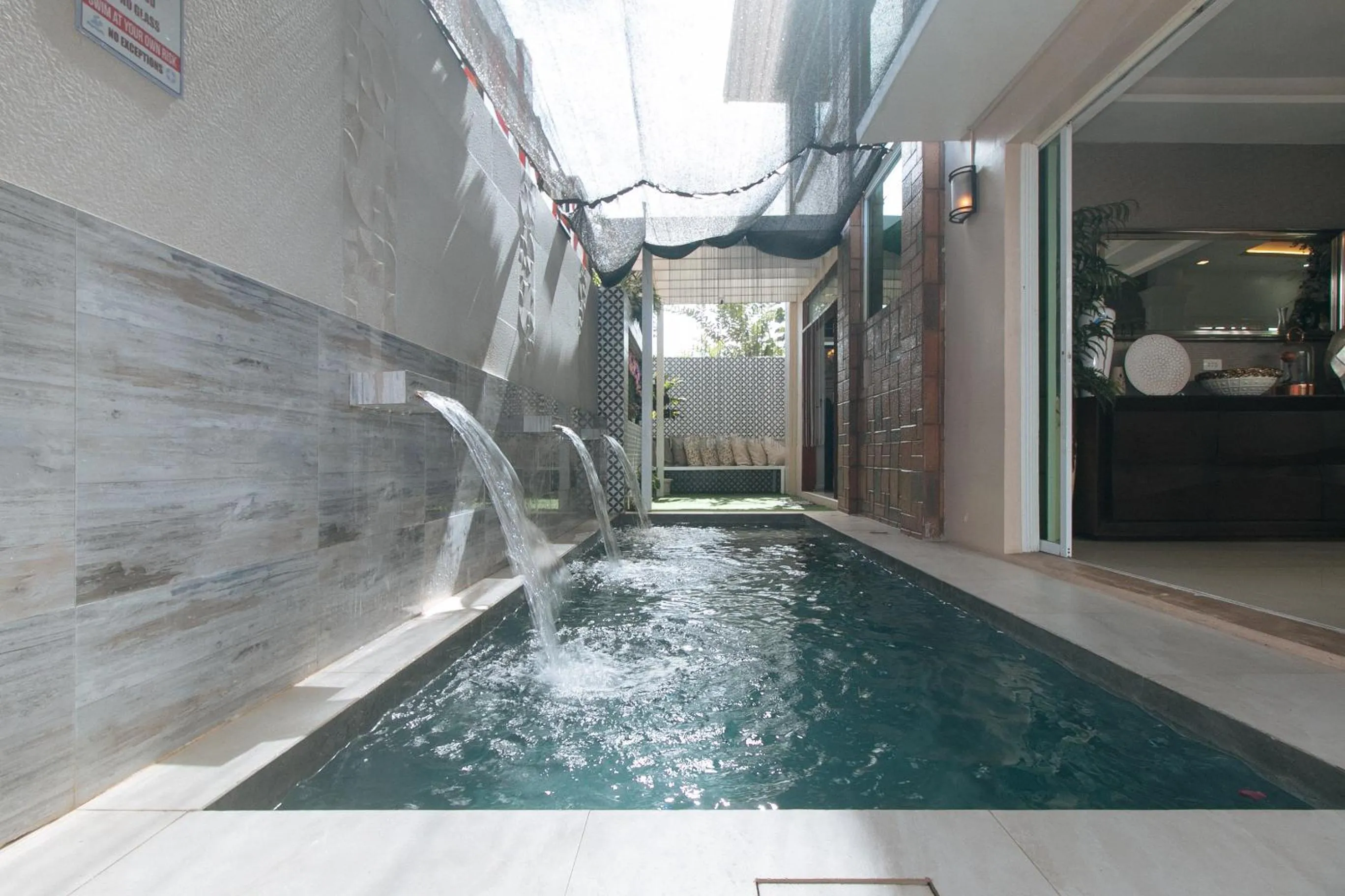 Pool view in RedDoorz Hostel @ St. Paul Village LapuLapu