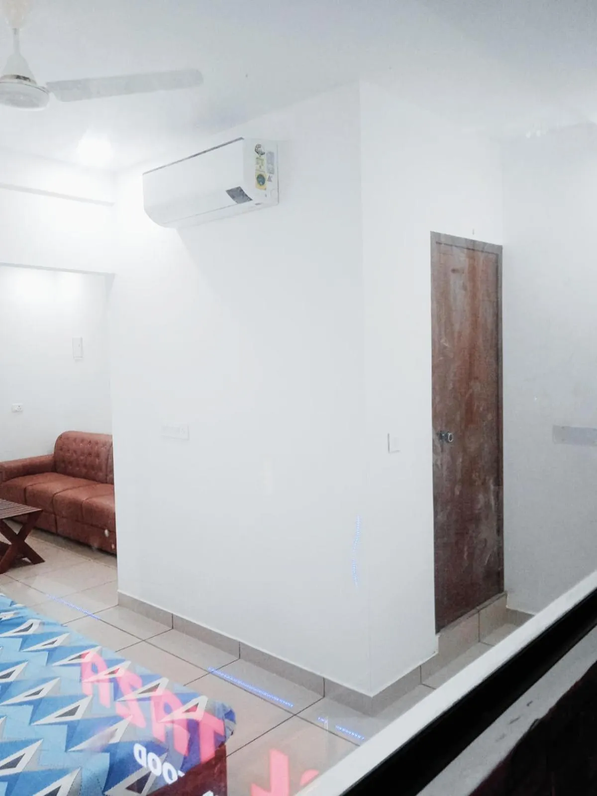 Living room, Bed in THEKKUMPURAM RESIDENCY