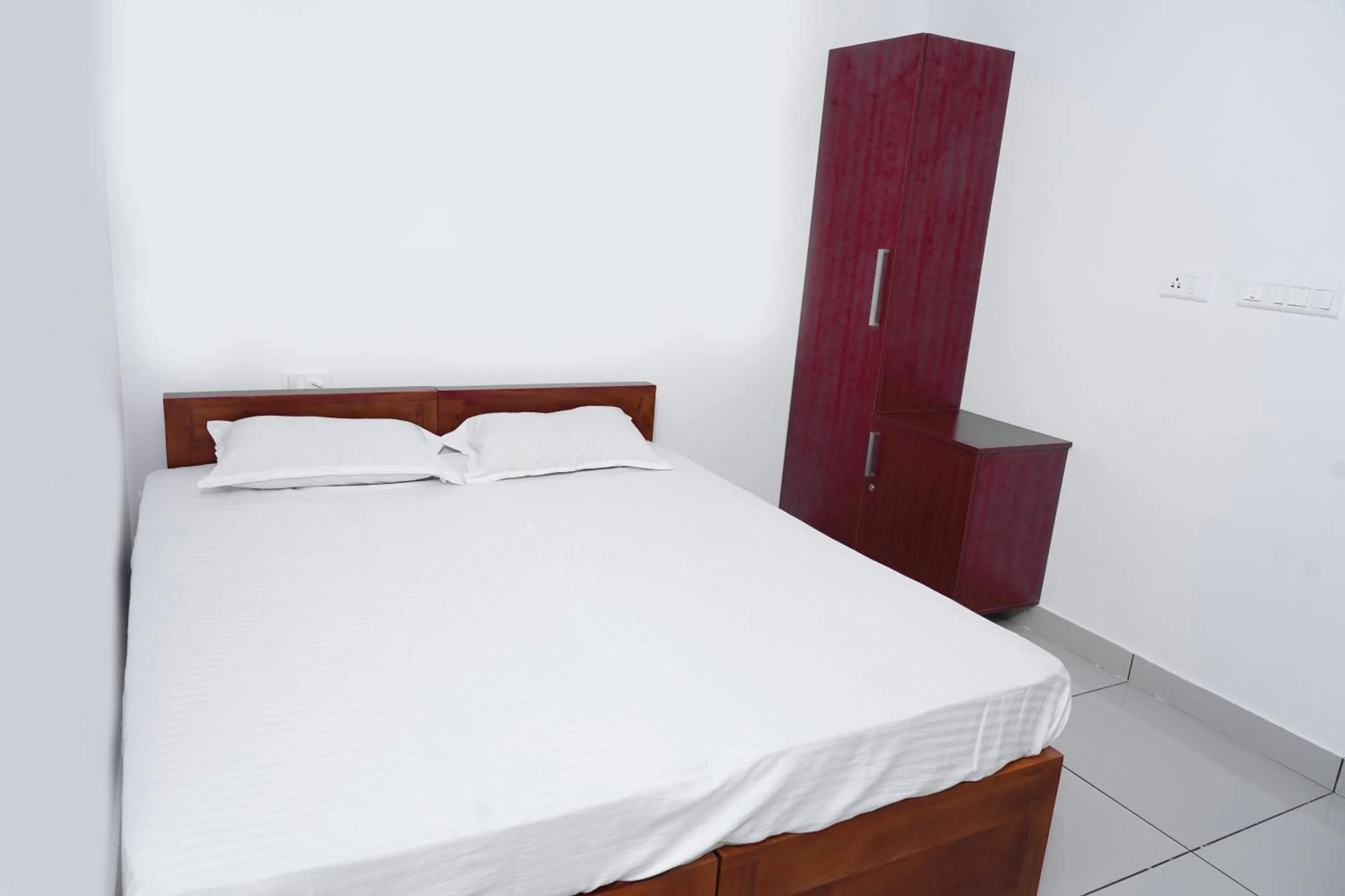 Bedroom, Bed in THEKKUMPURAM RESIDENCY