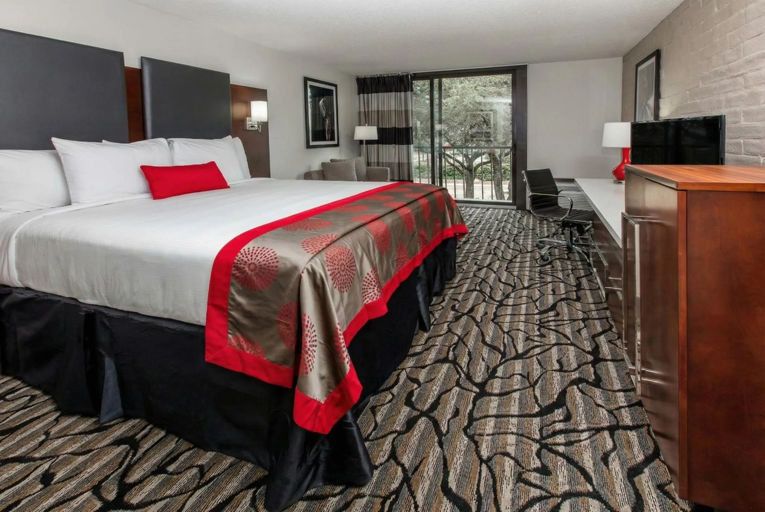 Bedroom, Bed in Ramada by Wyndham Austin South