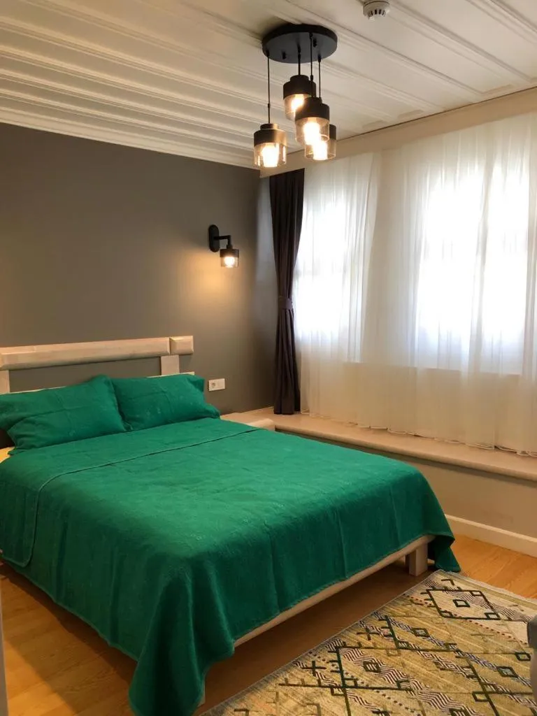 Bed in White Island Boutique Otel