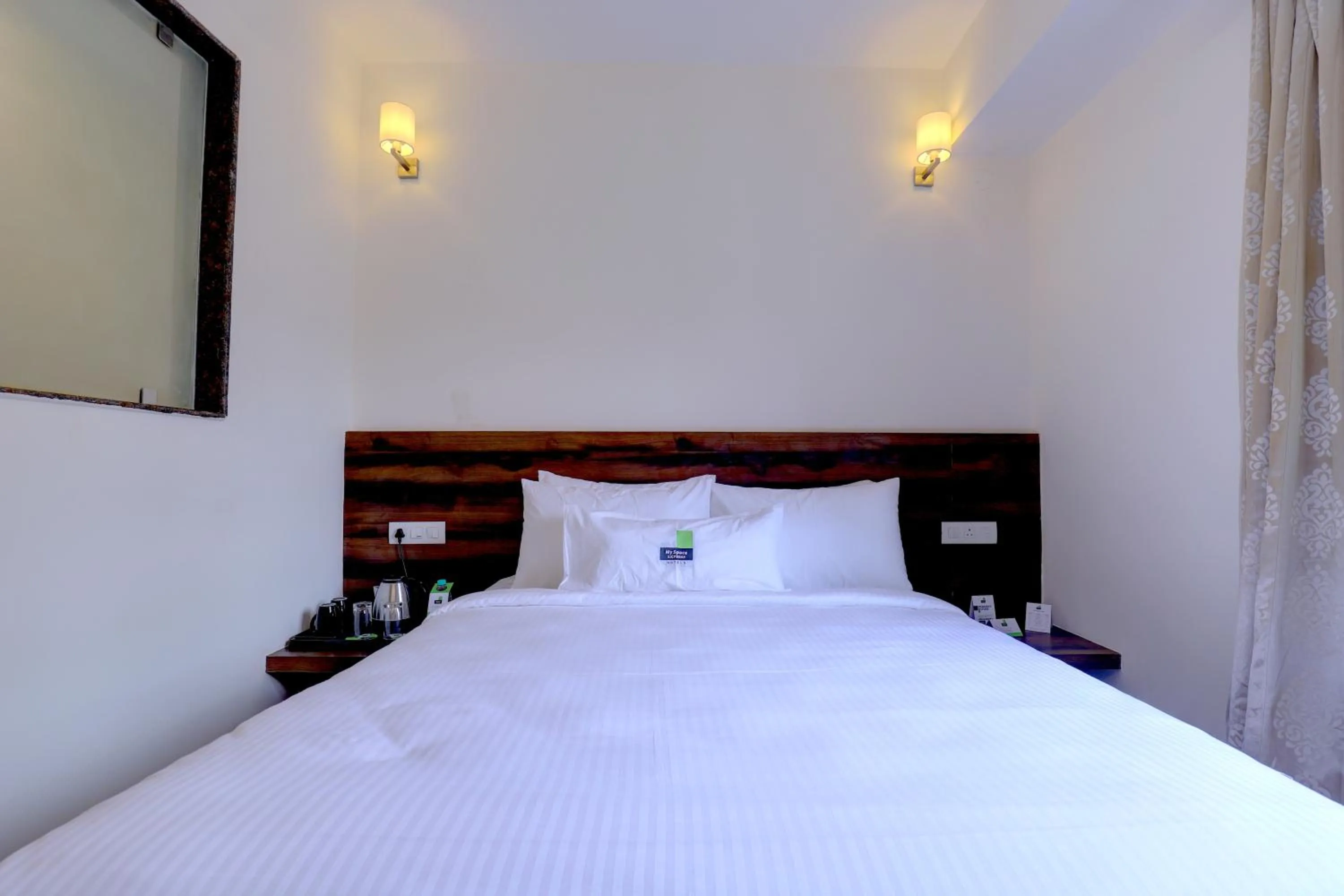 Bed in MySpace Express GD Inn