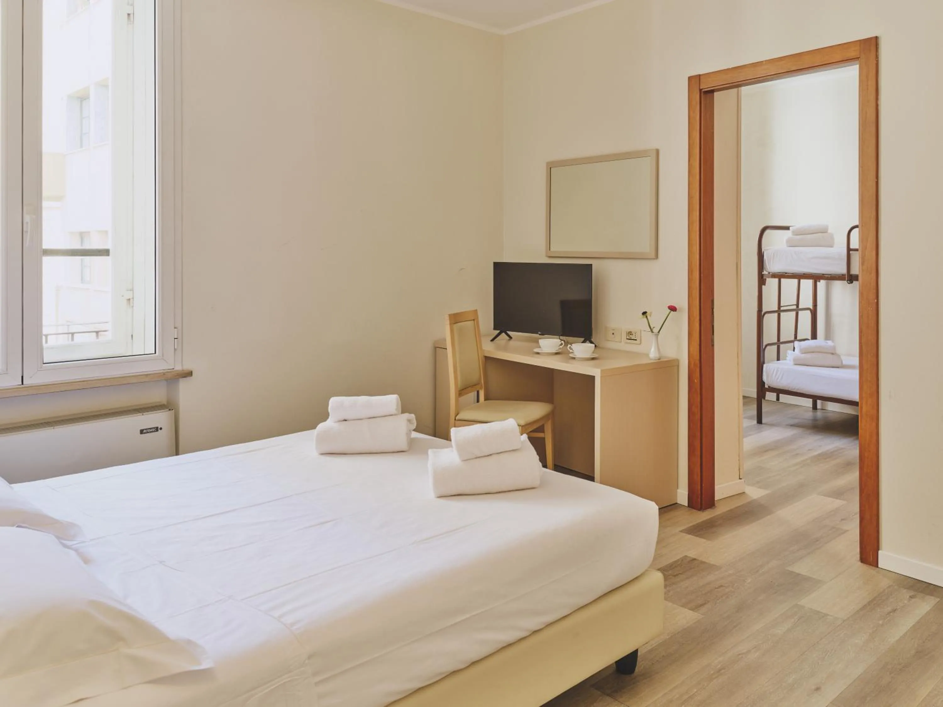 Bed in Hotel L'Aretino