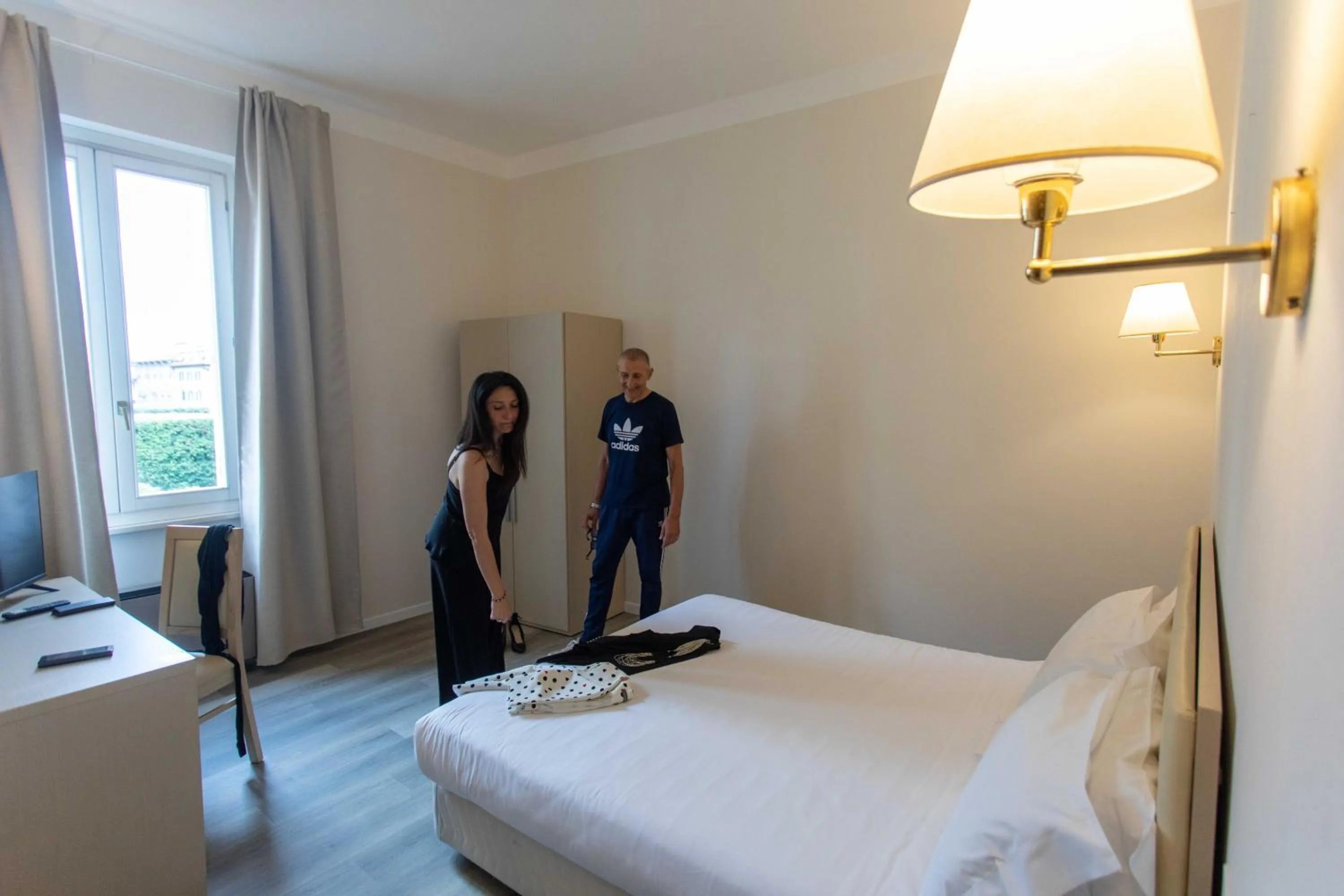 Bed in Hotel L'Aretino