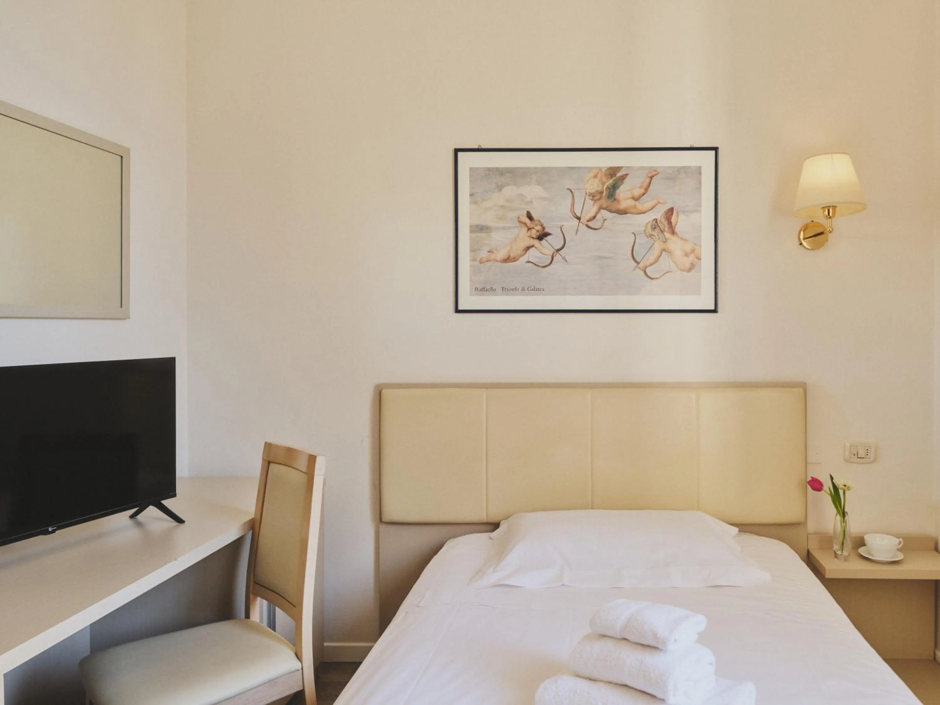 Bed in Hotel L'Aretino