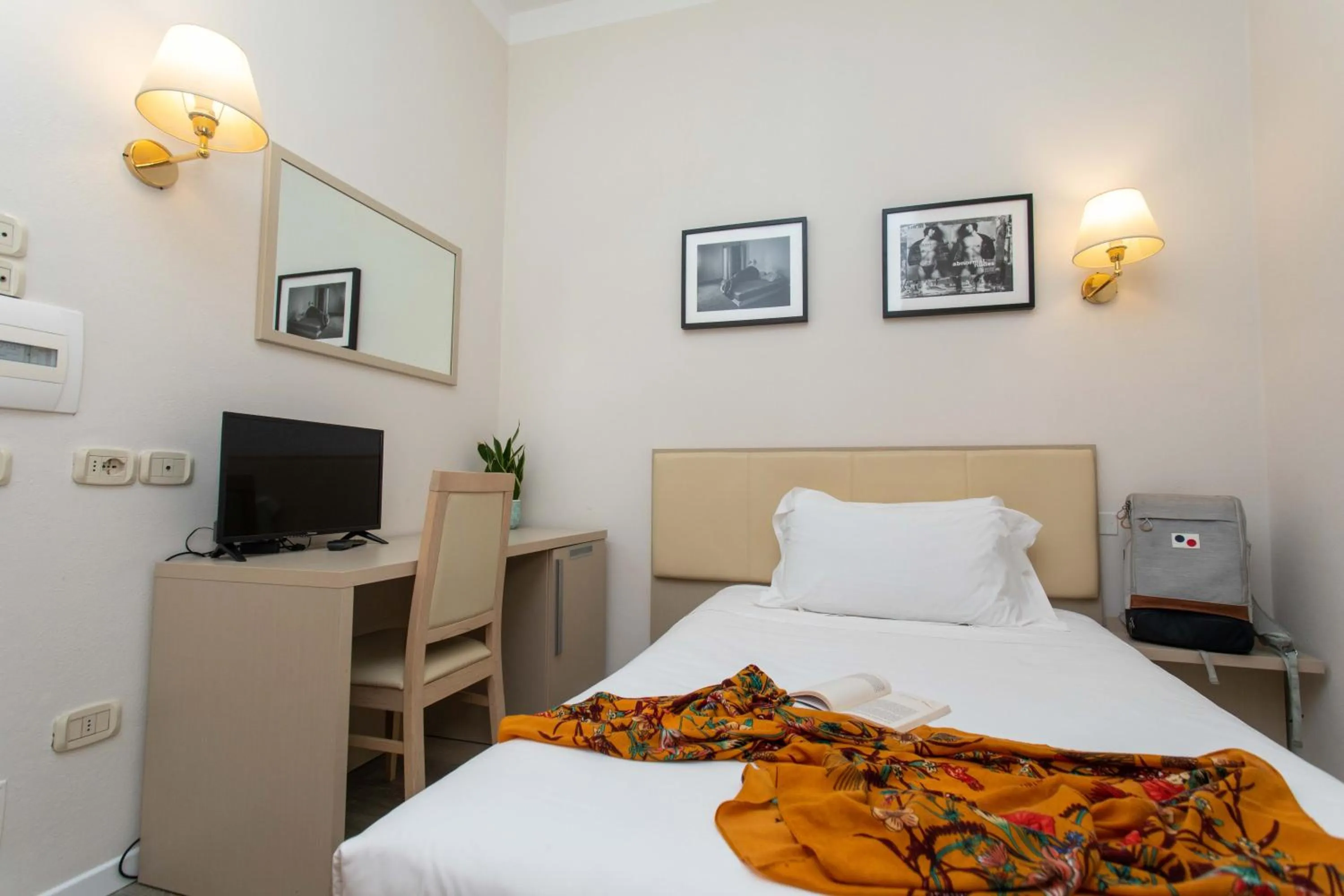 Bed in Hotel L'Aretino