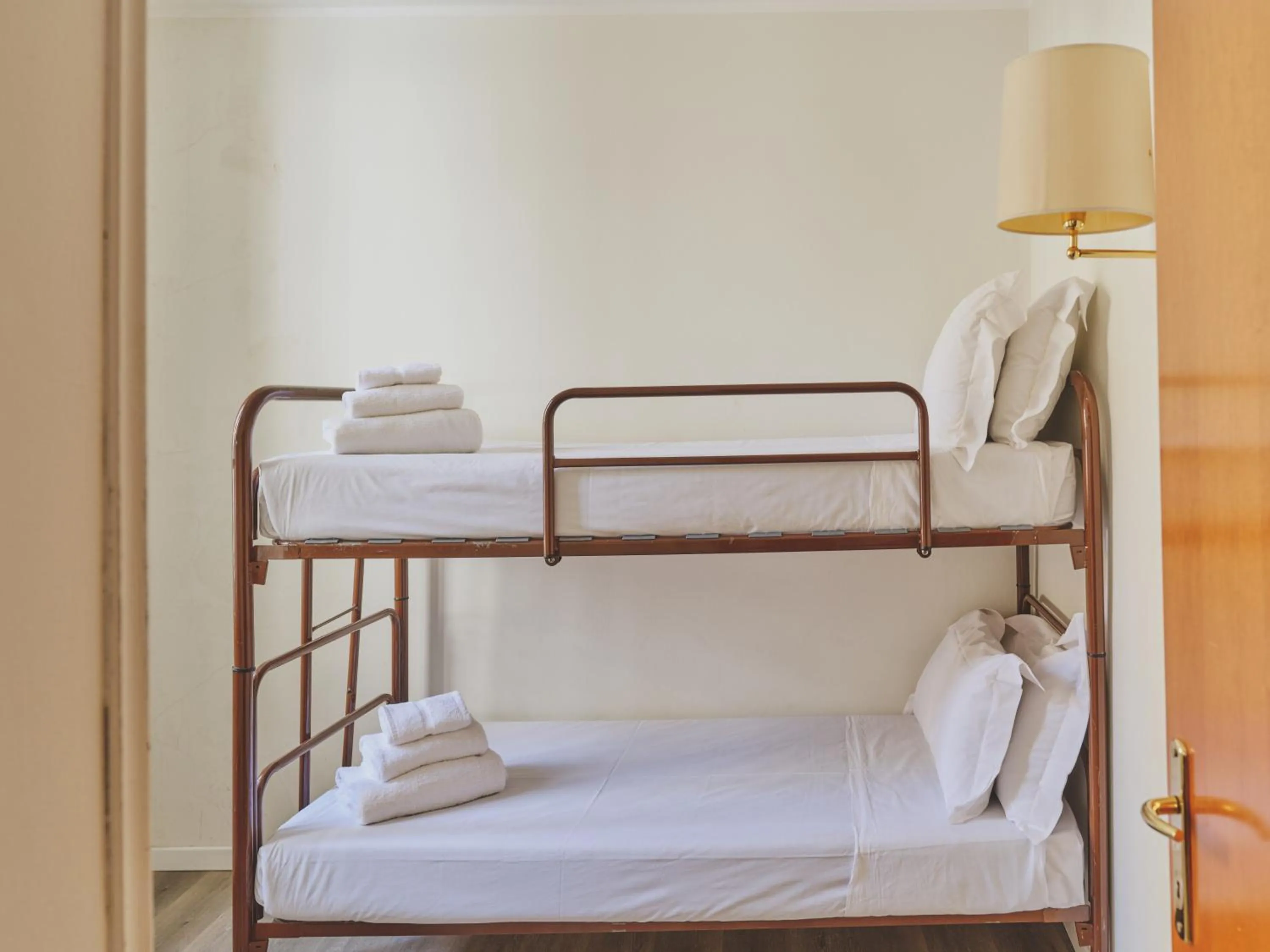 Bed in Hotel L'Aretino