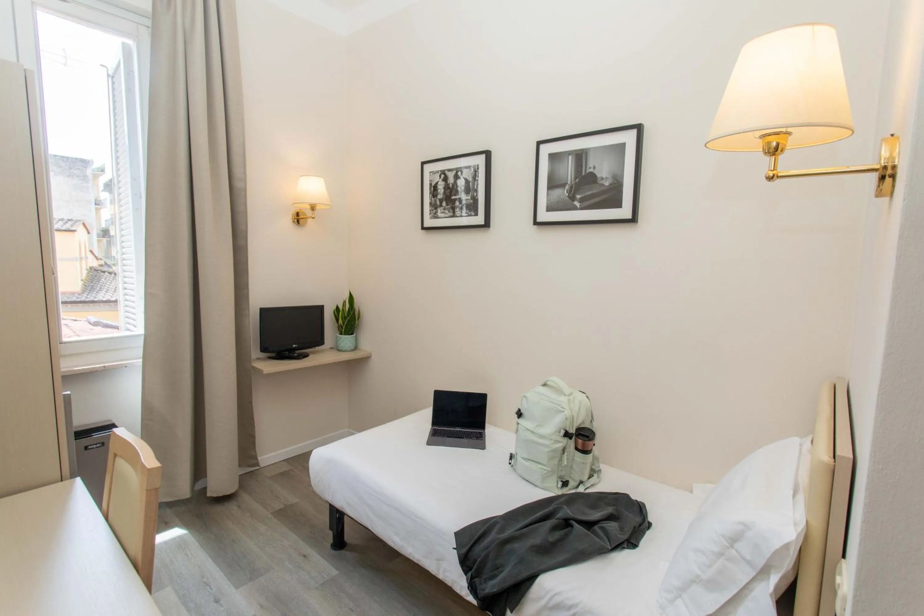 Bed in Hotel L'Aretino