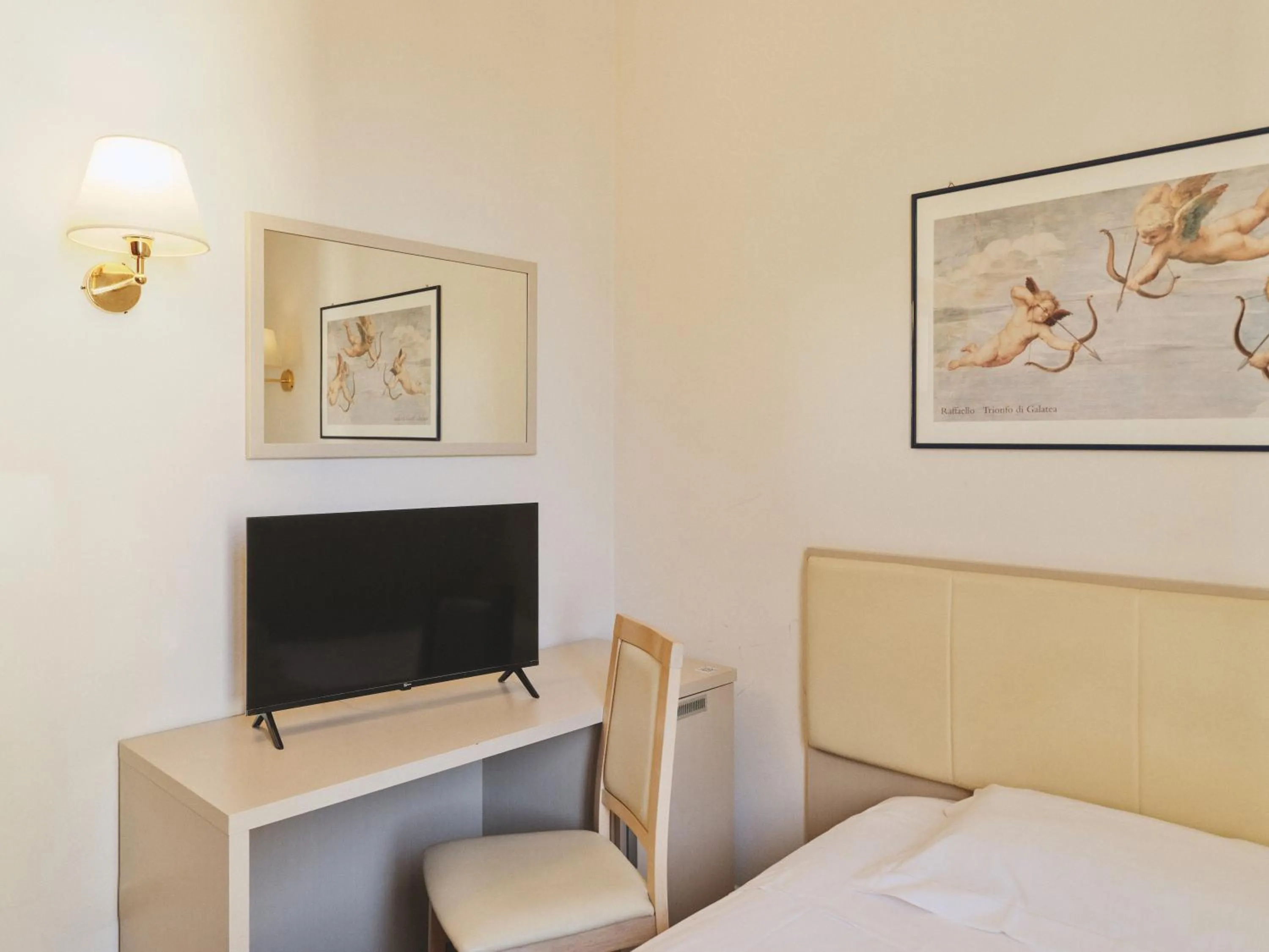 Bed in Hotel L'Aretino