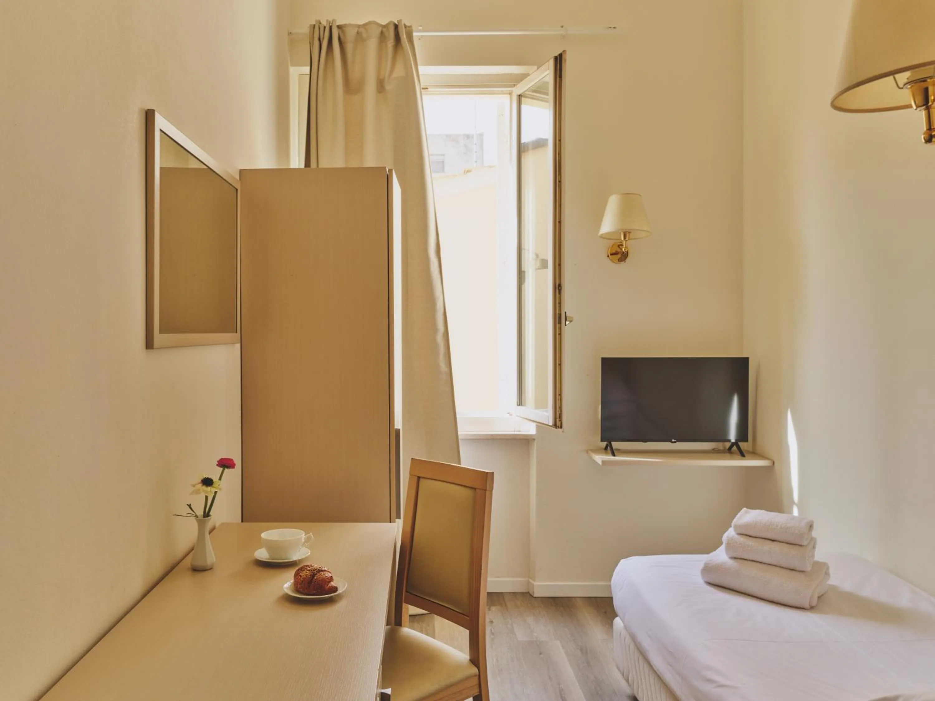 Bed in Hotel L'Aretino