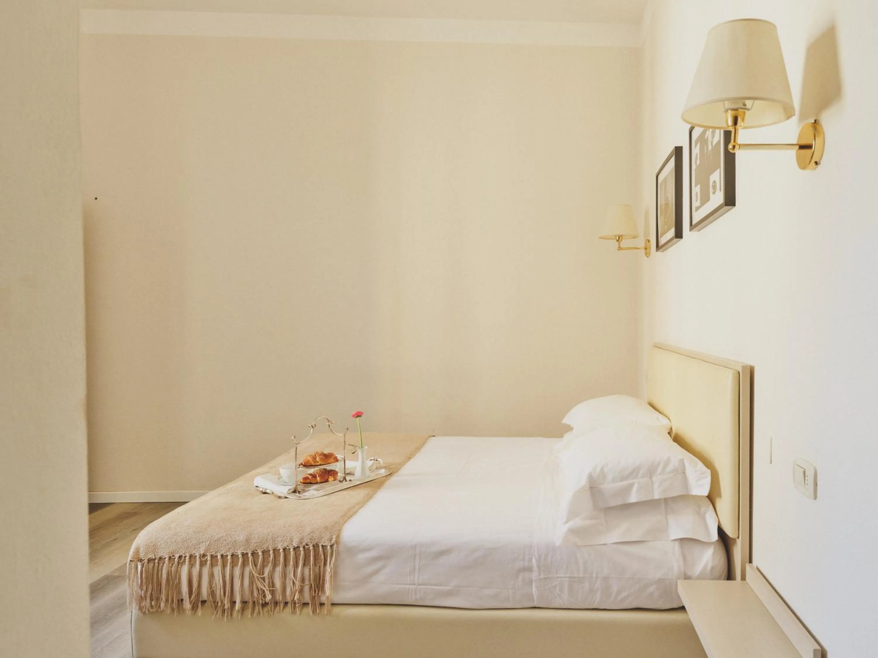 Bed in Hotel L'Aretino