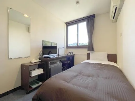 Bed in 釜石駅から徒歩5分ホテルマルエHotelMarue