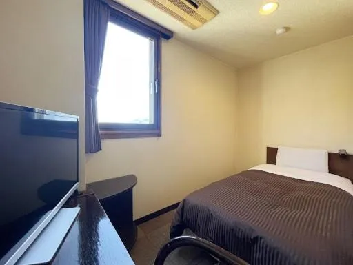 Bed in 釜石駅から徒歩5分ホテルマルエHotelMarue