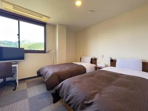 Bed in 釜石駅から徒歩5分ホテルマルエHotelMarue