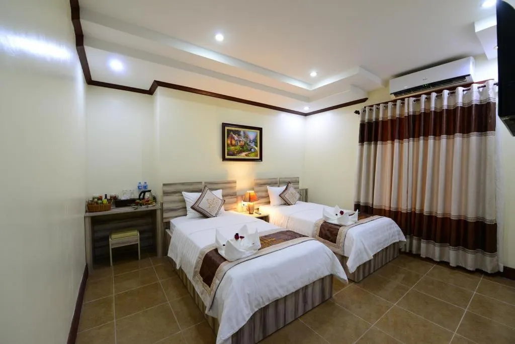 Bed in Vientiane Luxury Hotel
