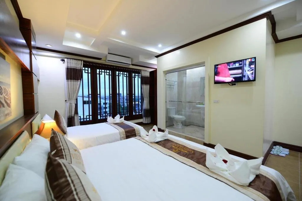 Bed in Vientiane Luxury Hotel