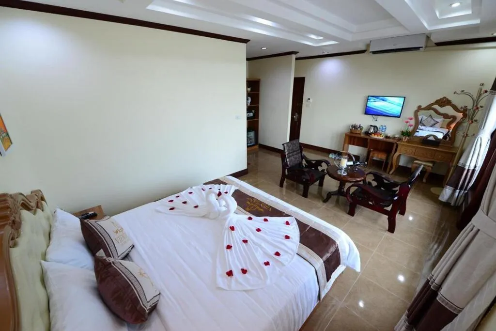 Bed in Vientiane Luxury Hotel