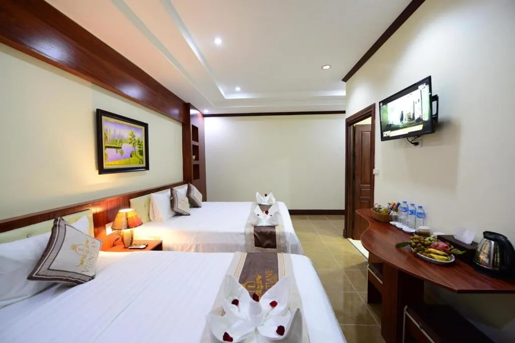 Bed in Vientiane Luxury Hotel