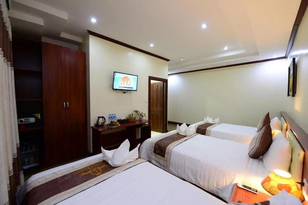 Bed in Vientiane Luxury Hotel