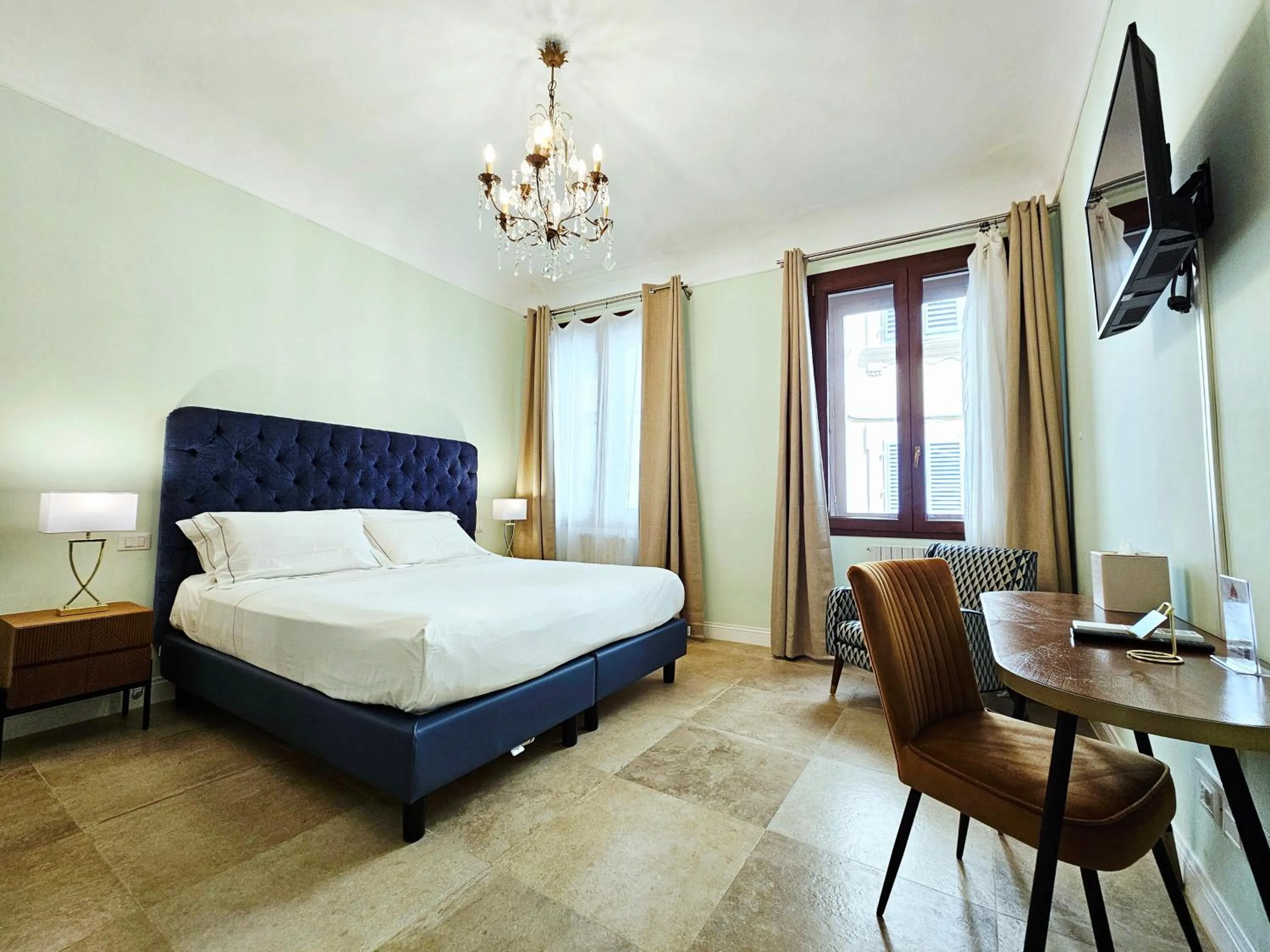 Bed in SPIRIT OF FLORENCE Boutique Rooms