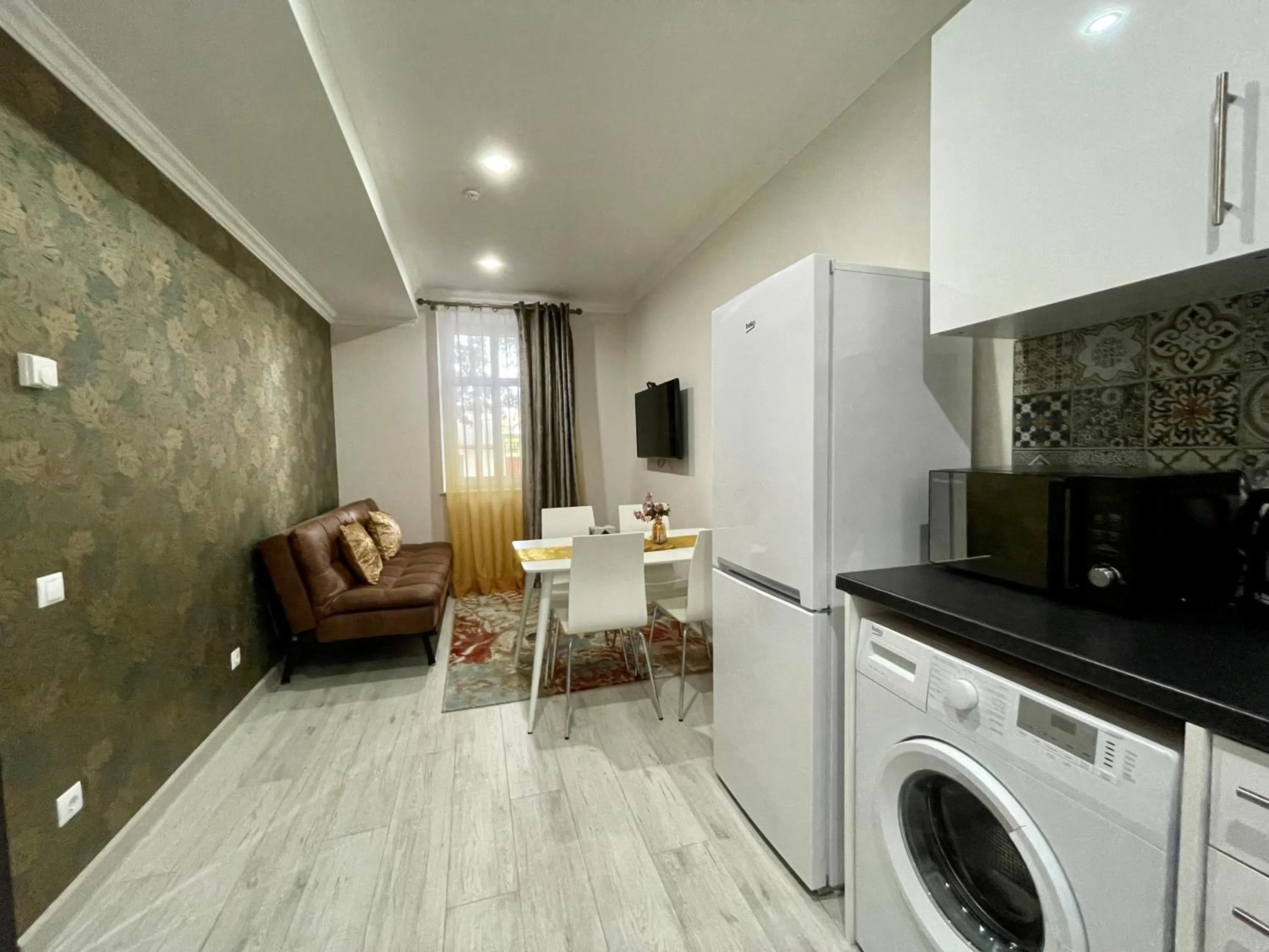 Kitchen or kitchenette in Premier City Apart Hotel Chisinau