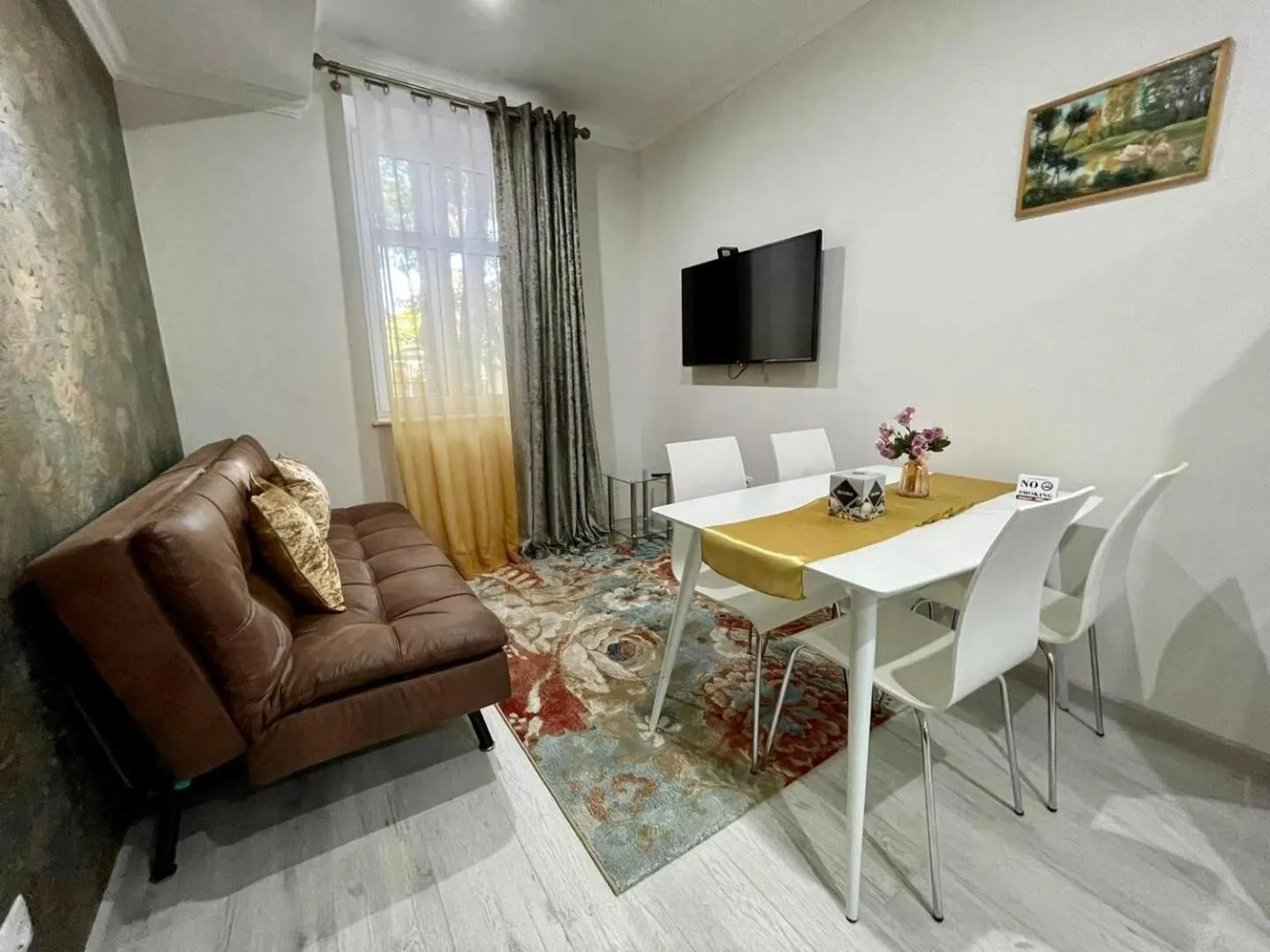 TV and multimedia in Premier City Apart Hotel Chisinau