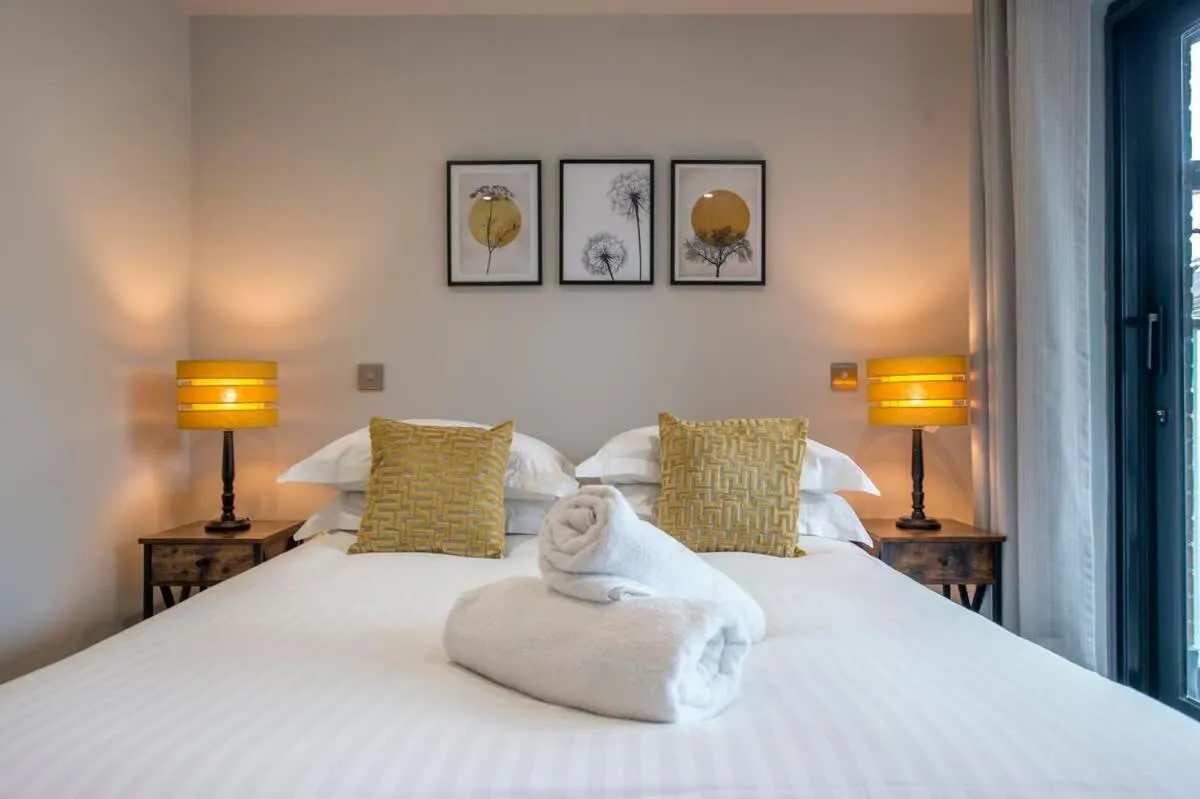 Bed in The Quadrant - The Botanical Suite