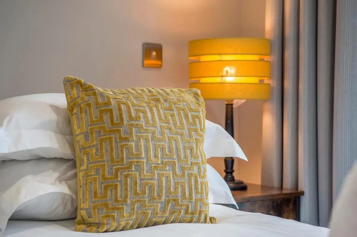 Bed in The Quadrant - The Botanical Suite