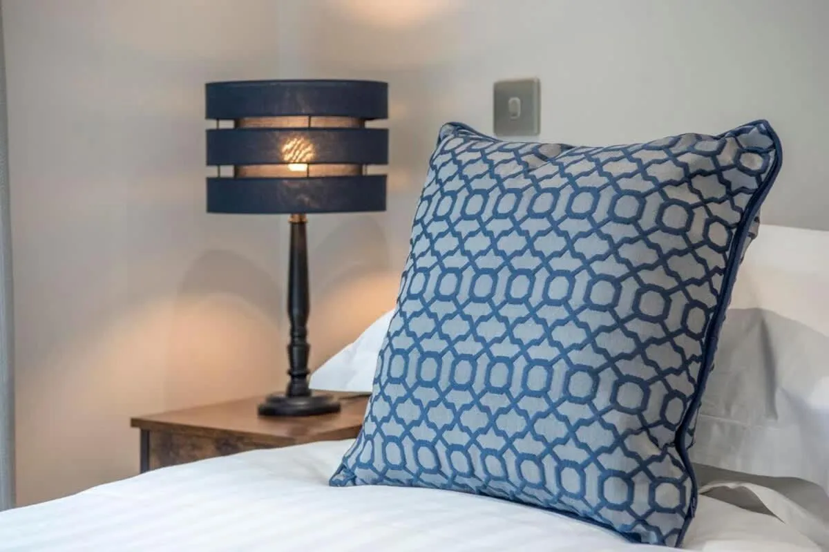 Bed in The Quadrant - The Botanical Suite