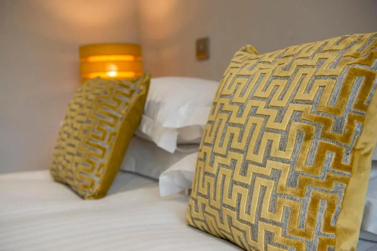 Bed in The Quadrant - The Botanical Suite