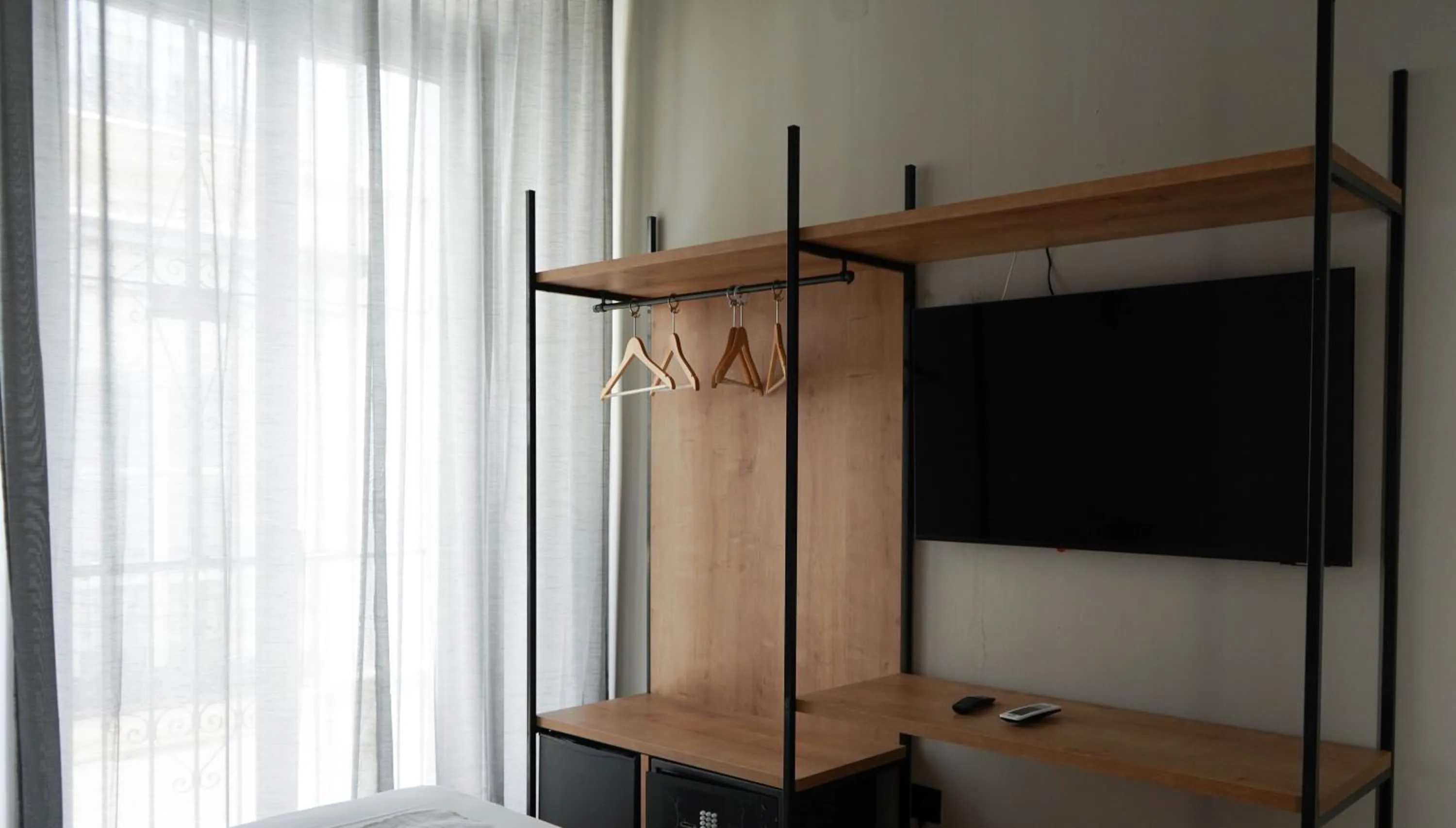 TV and multimedia in Sweet Sevilla Hostel