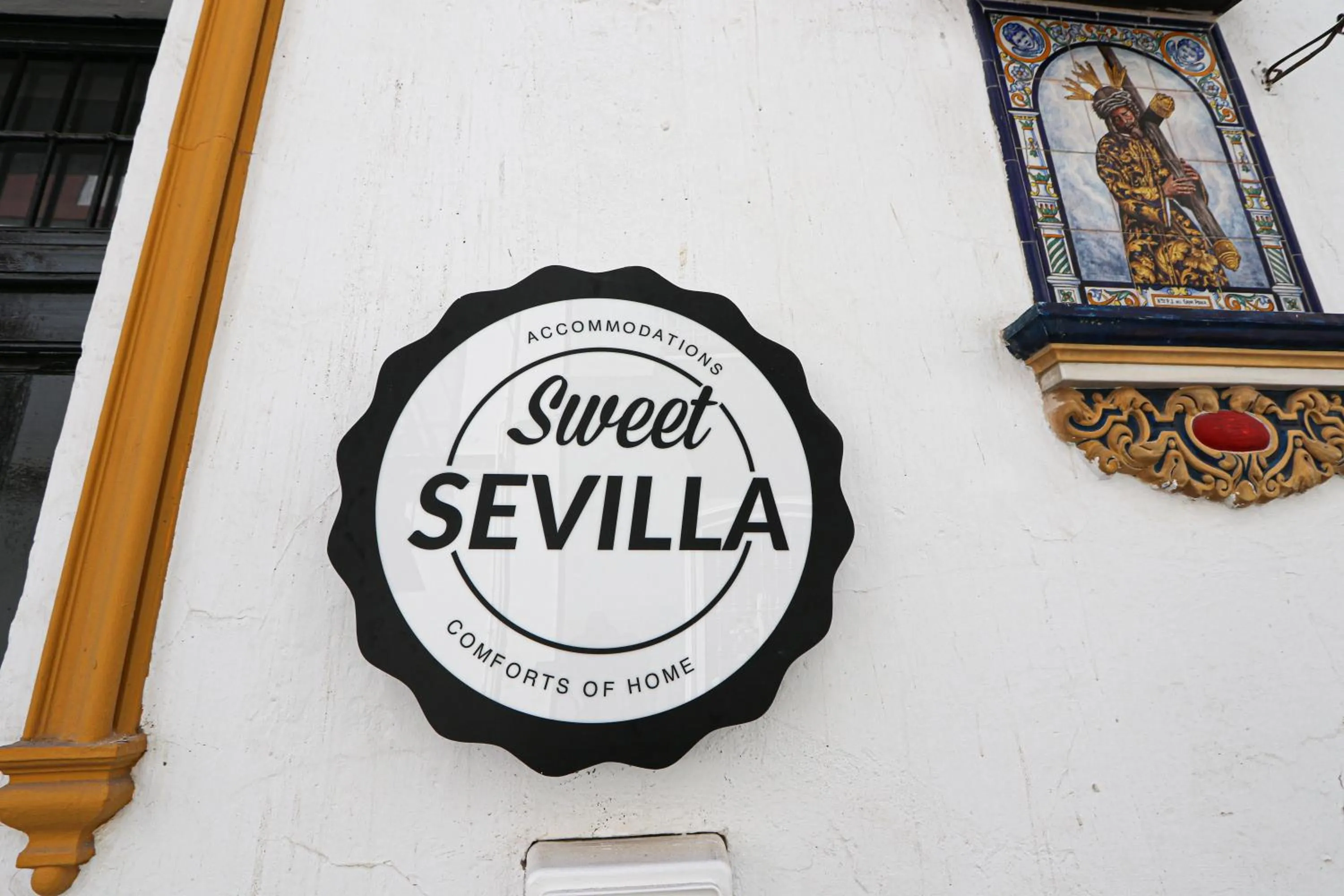 Logo/Certificate/Sign in Sweet Sevilla Hostel