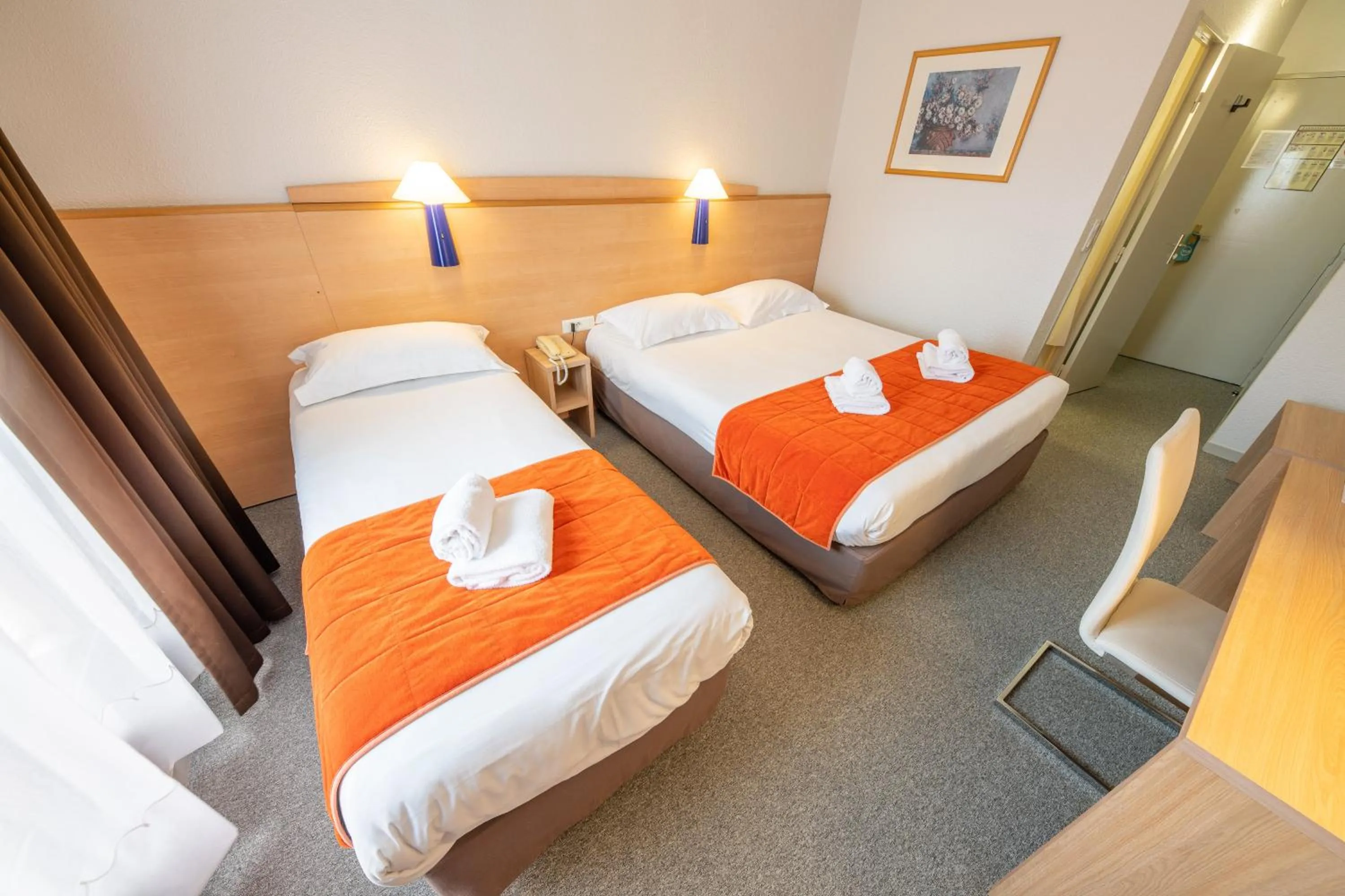 Photo of the whole room, Bed in Hôtel Saint Laurent