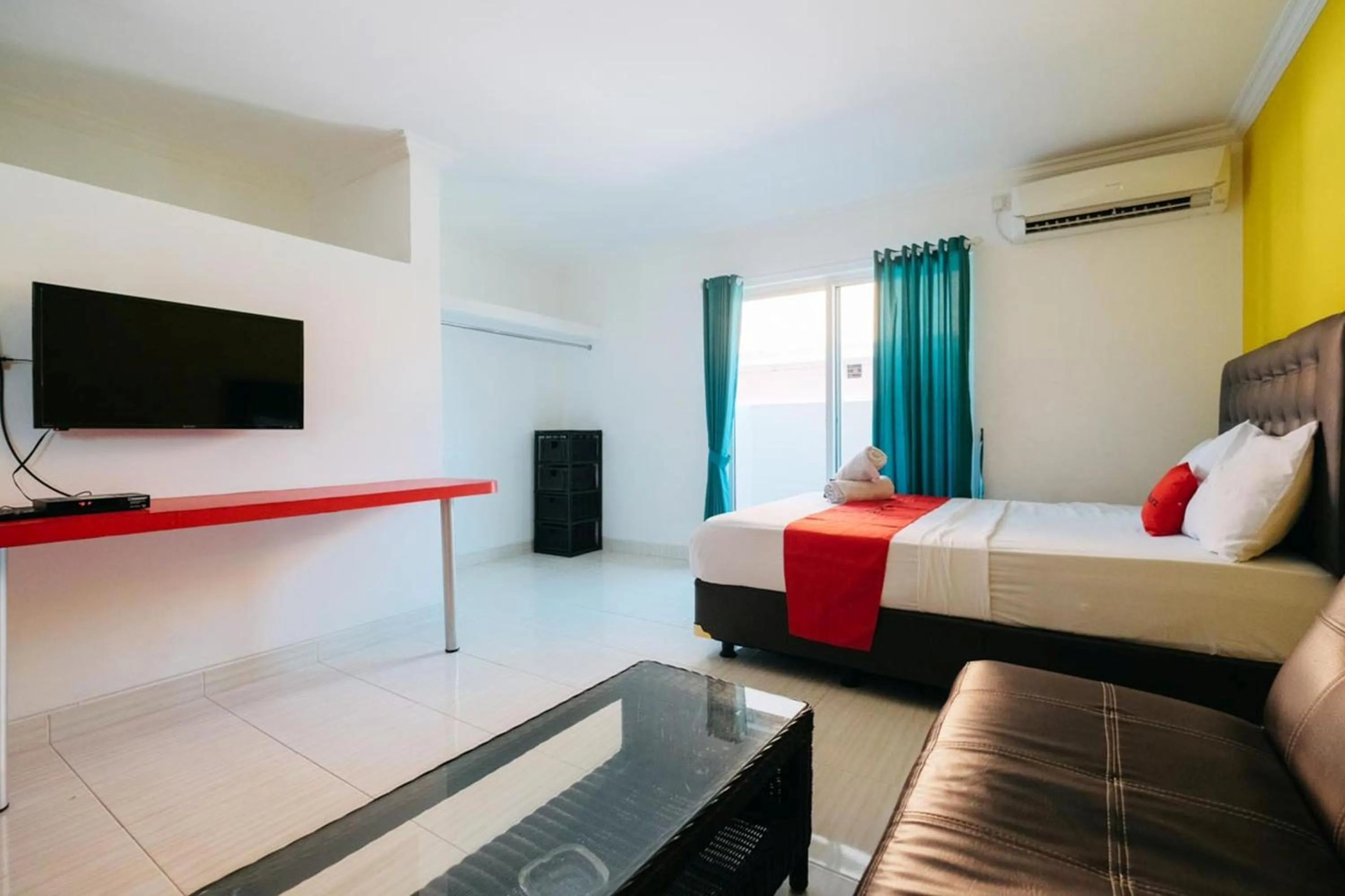 Bed in RedDoorz at Kawaii Apartment Jimbaran