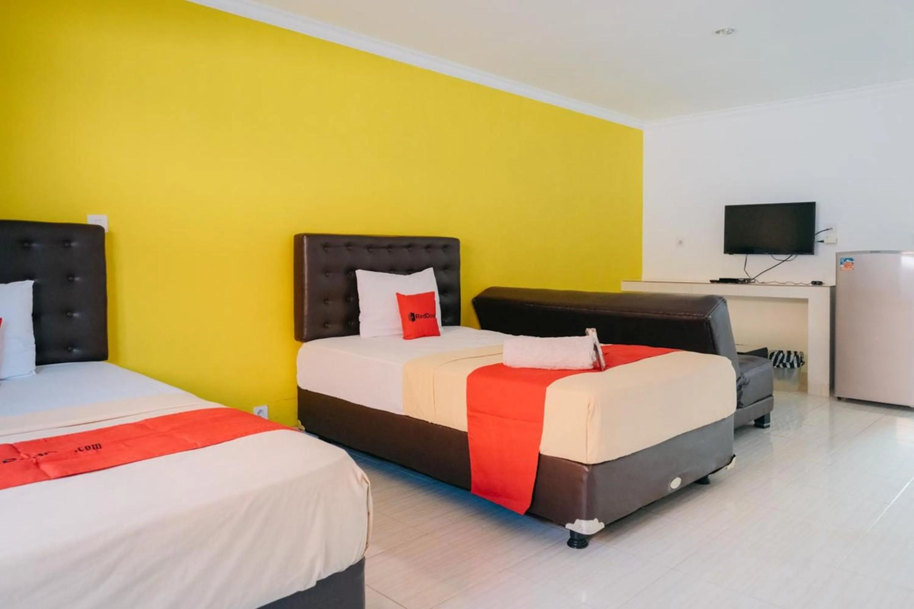 Bed in RedDoorz at Kawaii Apartment Jimbaran