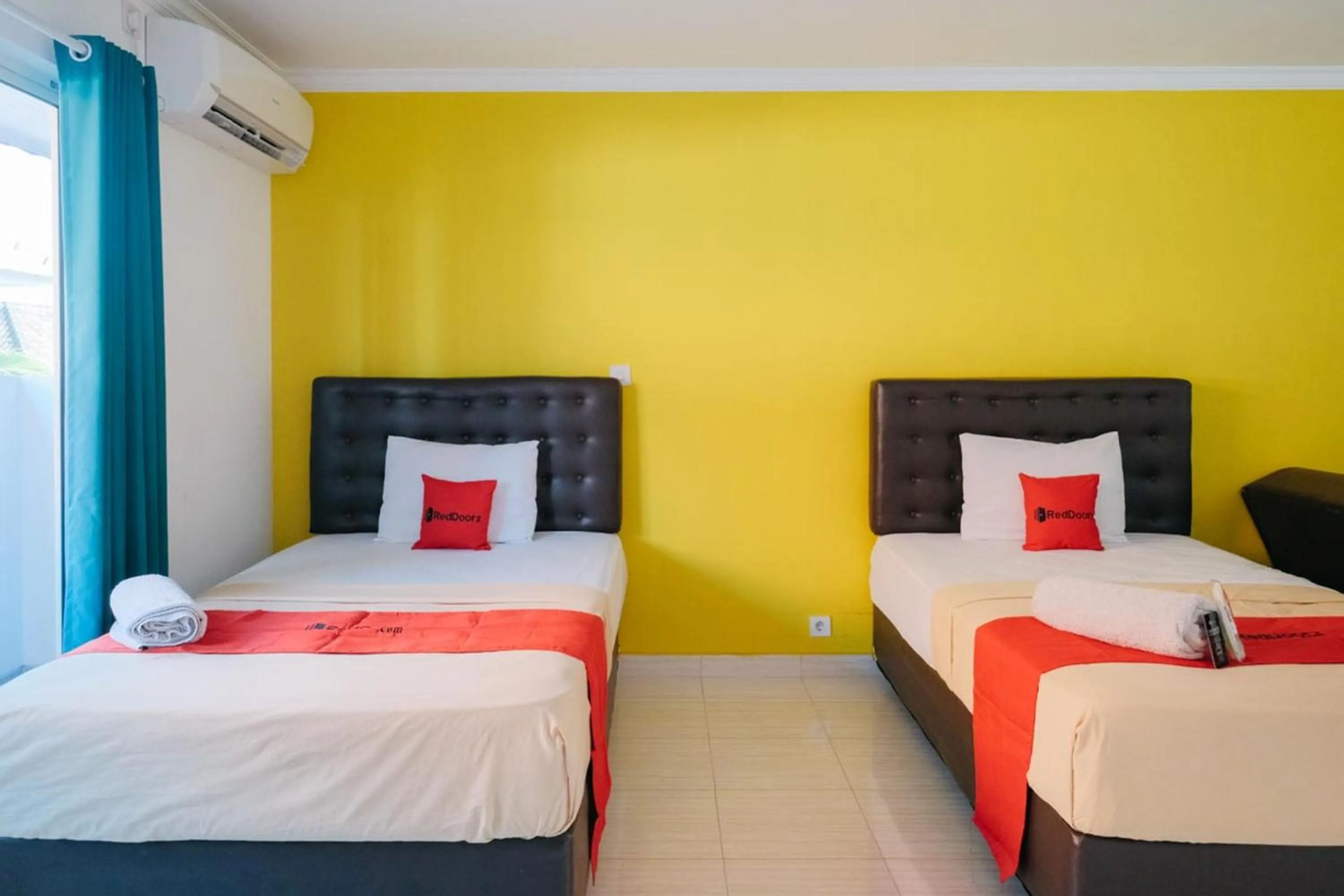 Bed in RedDoorz at Kawaii Apartment Jimbaran