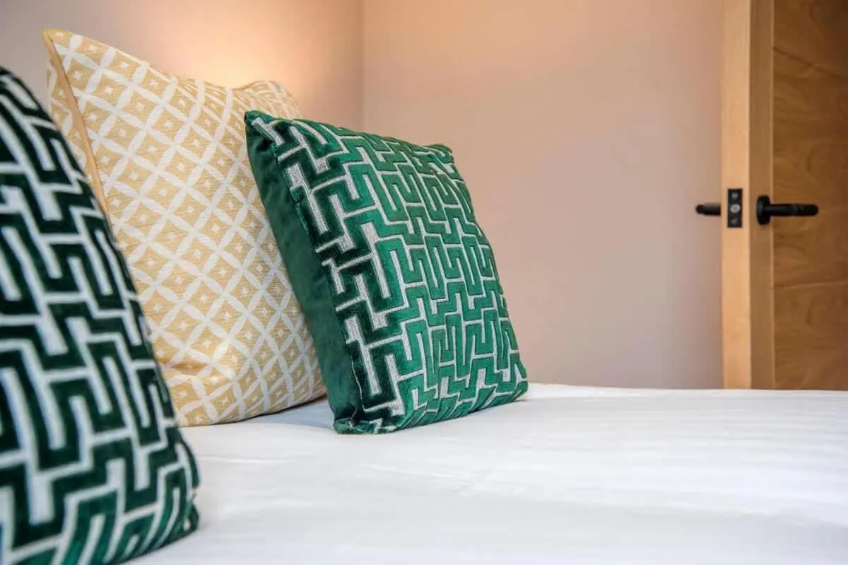 Bed in The Quadrant - The Palm Suite