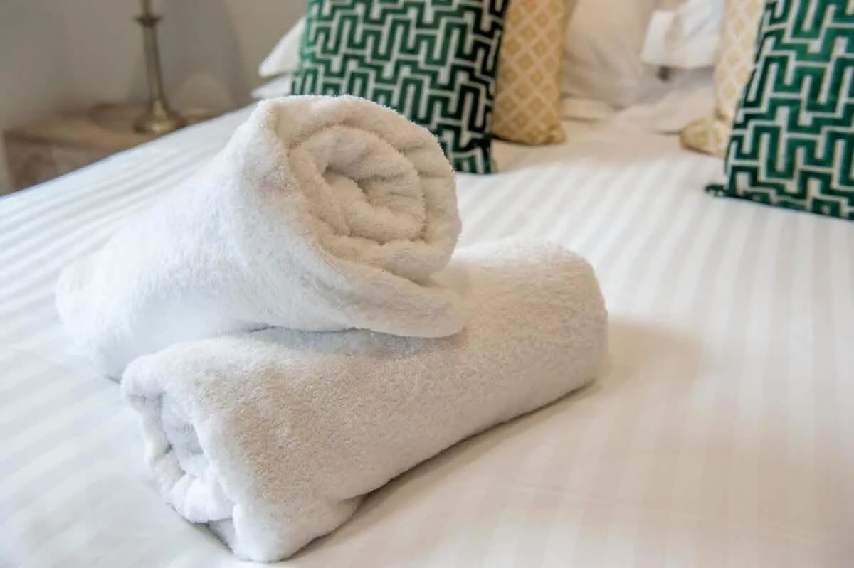 Bed in The Quadrant - The Palm Suite