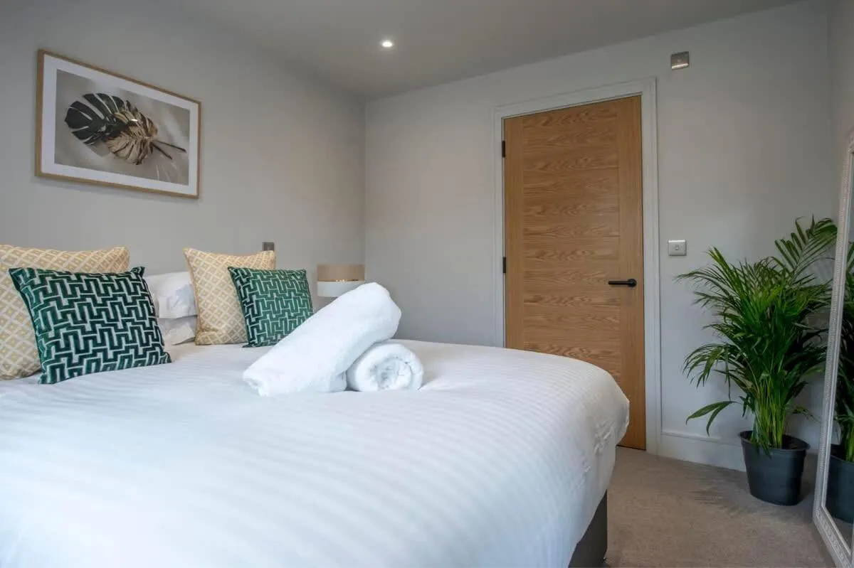 Bed in The Quadrant - The Palm Suite